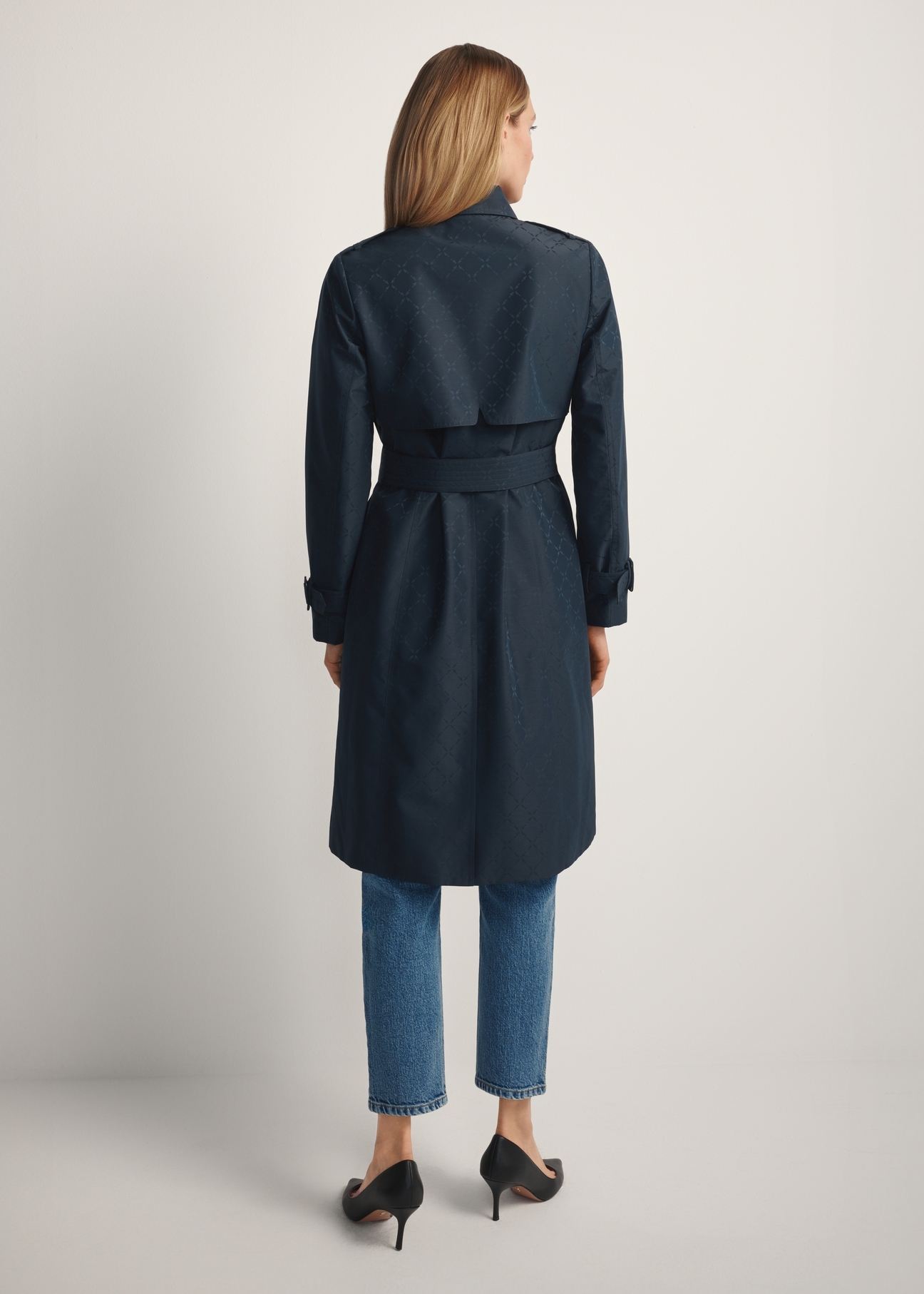 Navy blue women's coat with monogram KURDT-0651-7E(W26), back view of the product on the model. Full body visible.