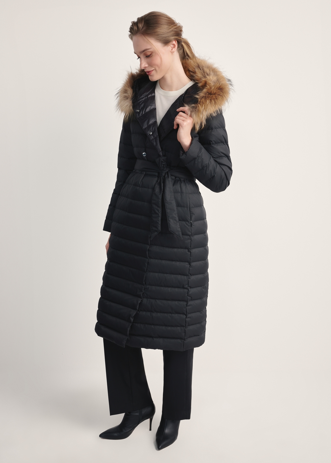 Women's long quilted jacket with duck down KURDT-0616-99(Z25), front view of the product on the model. Full body visible.