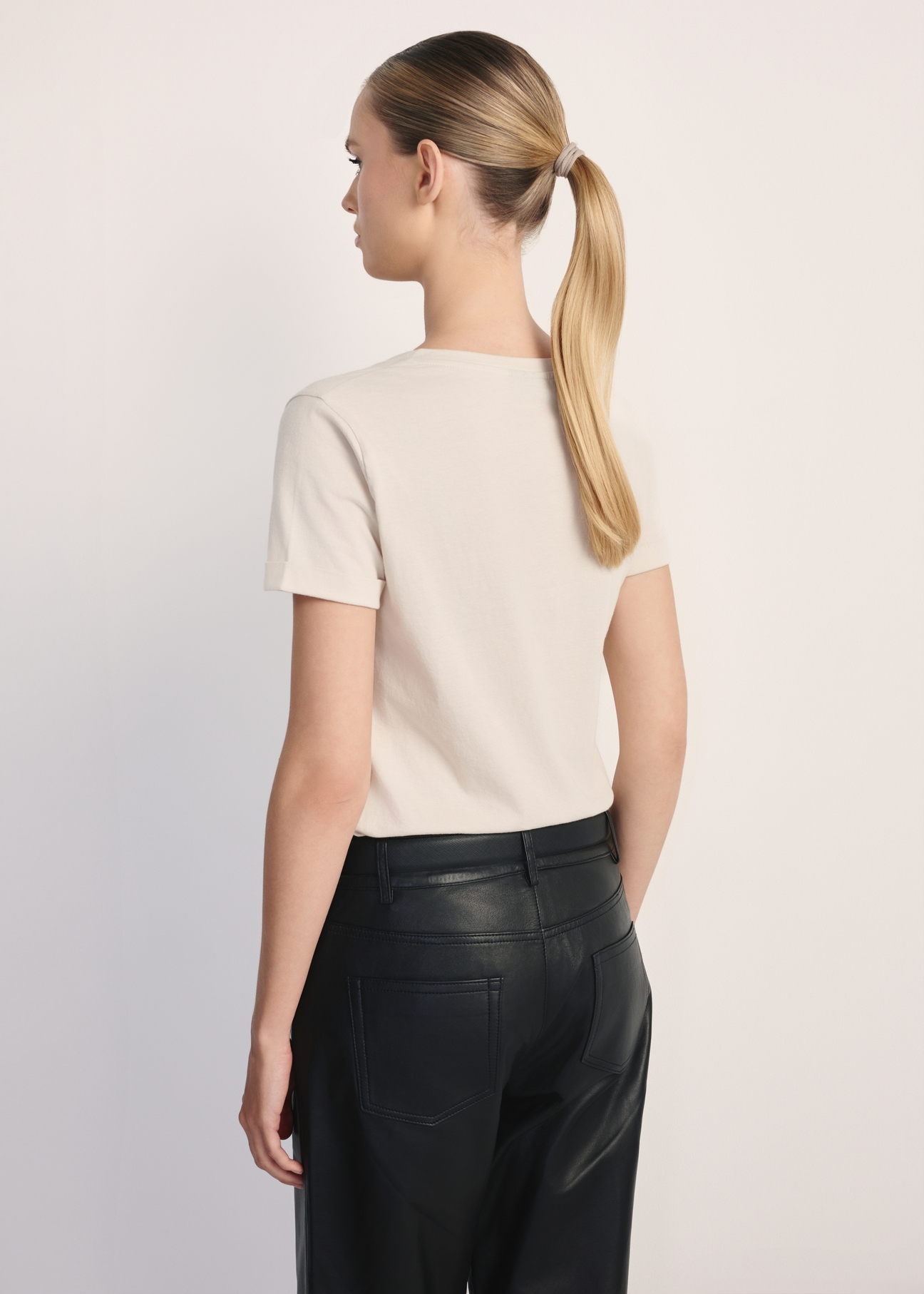 Beige women's V-neck T-shirt TSHDT-0118A-80(Z25), product view from the back on the model. Half of the silhouette visible.