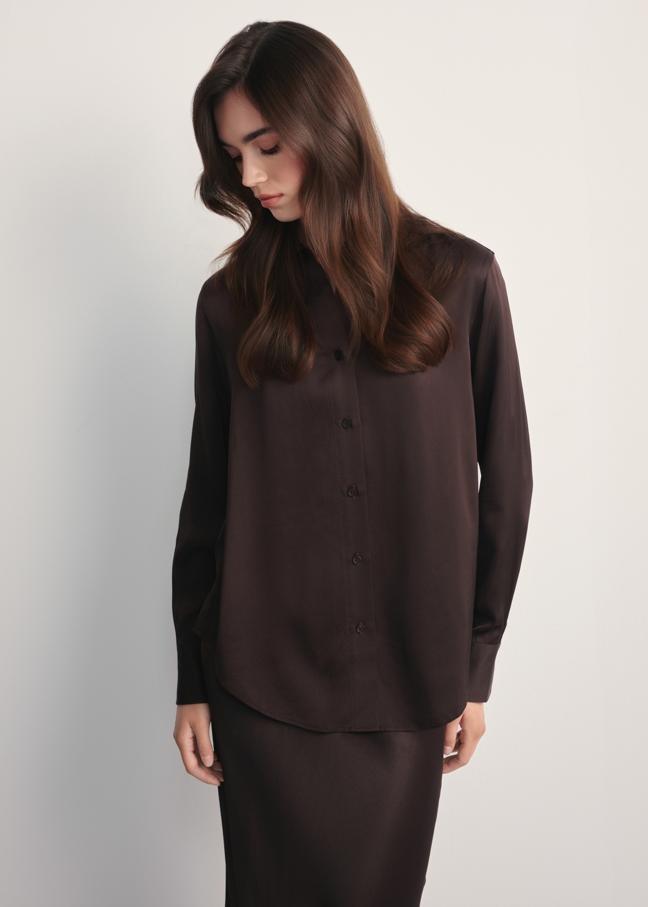Chocolate women's shirt KOSDT-0172-90(Z25), front view of the product on the model. Half of the silhouette visible.