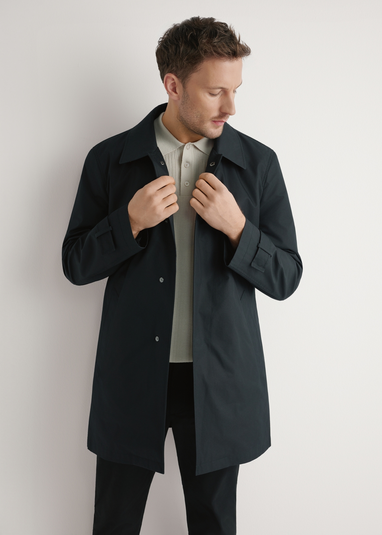 Men's black insulated jacket KURMT-0408-99(W26), front product view on model. Half silhouette visible.