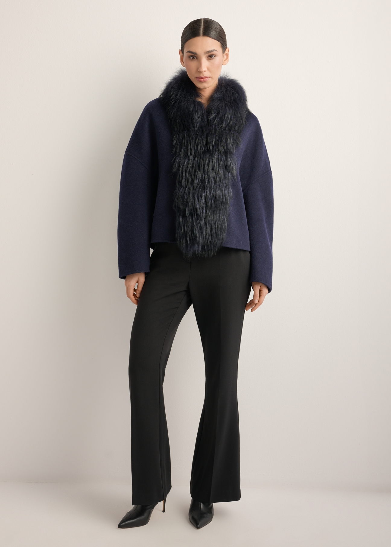 Women's short wool fur coat in navy blue FUTDW-0038-7E(Z26), front view of the product on the model. Full body visible.