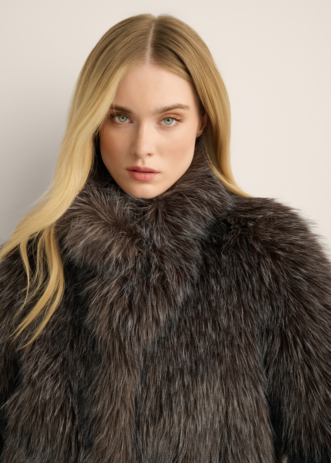 Women's short brown fur coat FUTDP-0086-1H(Z26), front view of the product on the model. Close-up of the model's face.