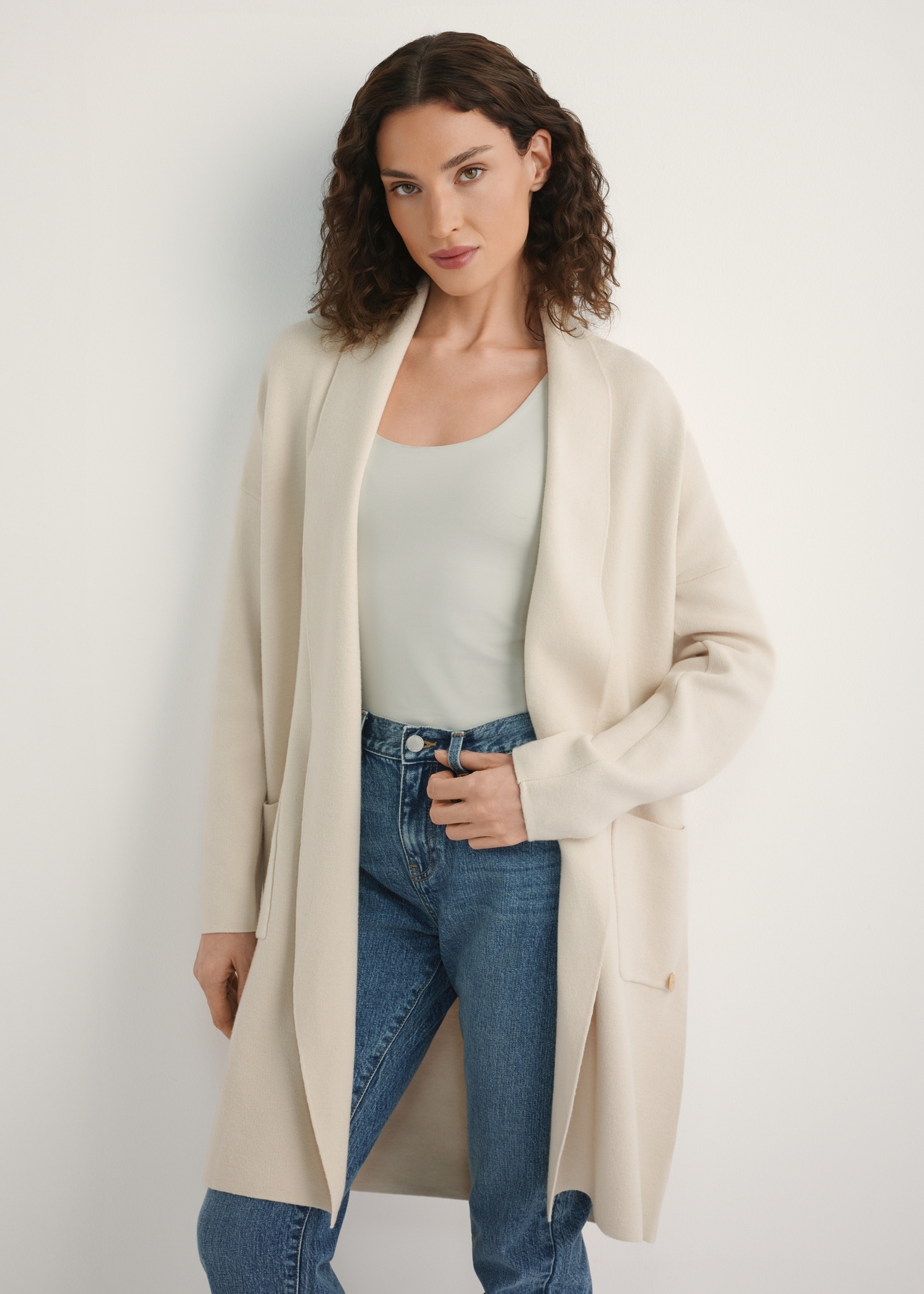 Beige women's cardigan KARDT-0041-1A(W26), front view of the product on the model. Full body visible.