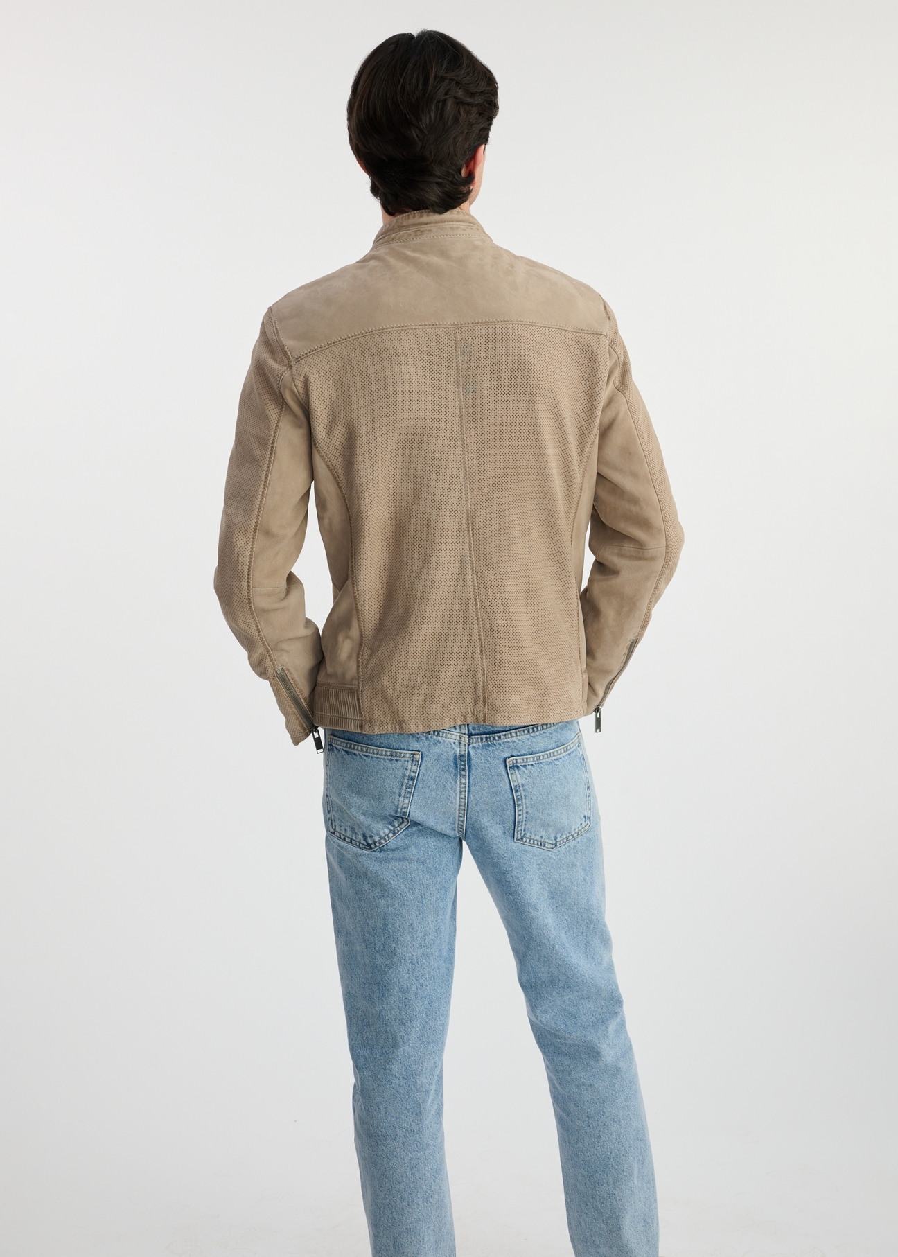 Beige men's jacket made of genuine leather KURMS-0369-2845(W25) - back view on the model on a white background. The entire silhouette is visible.