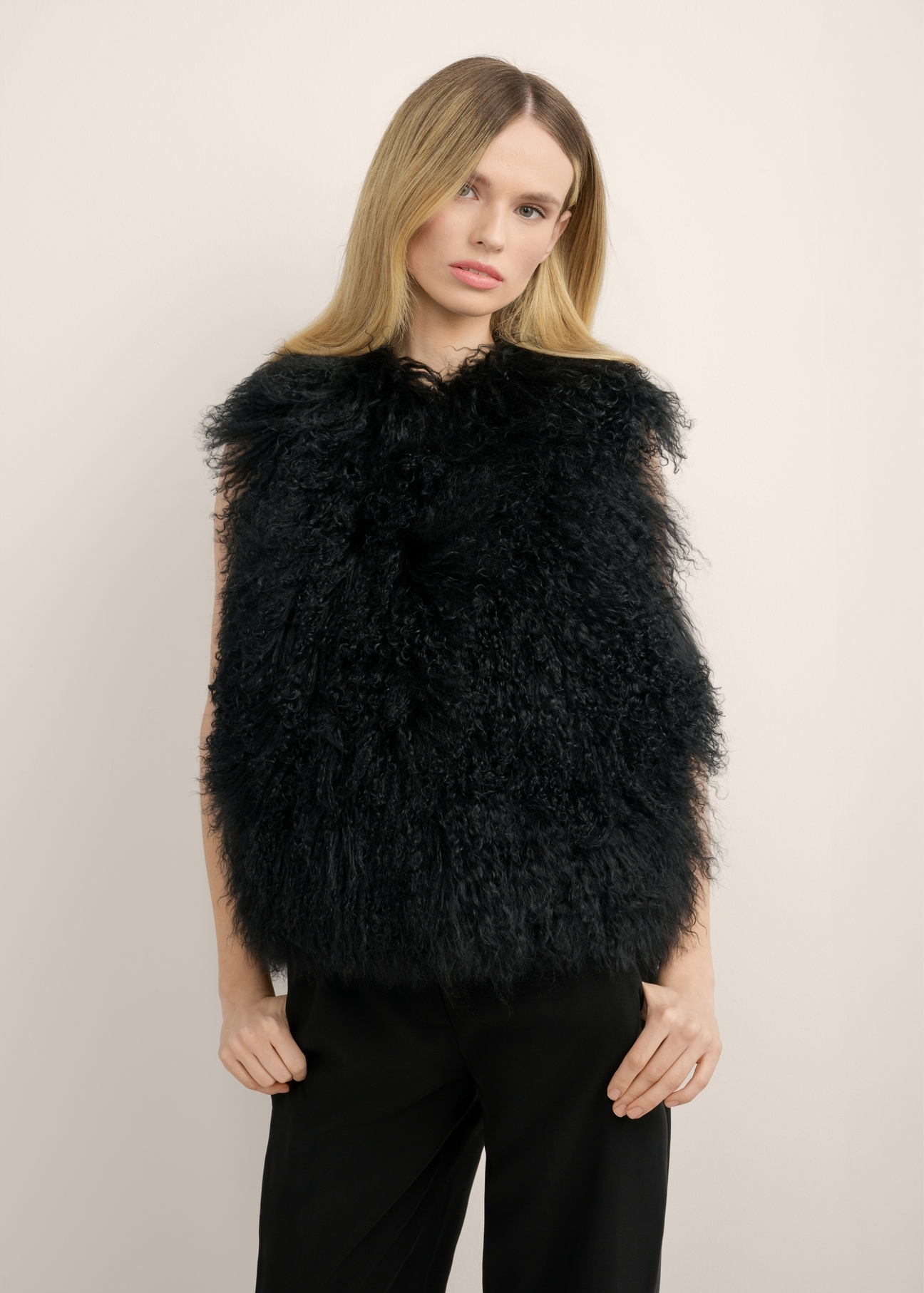 Women's black vest KAMDF-0061-99(Z26) - front view of the product, on a model, against a light background. Knee-length silhouette visible.