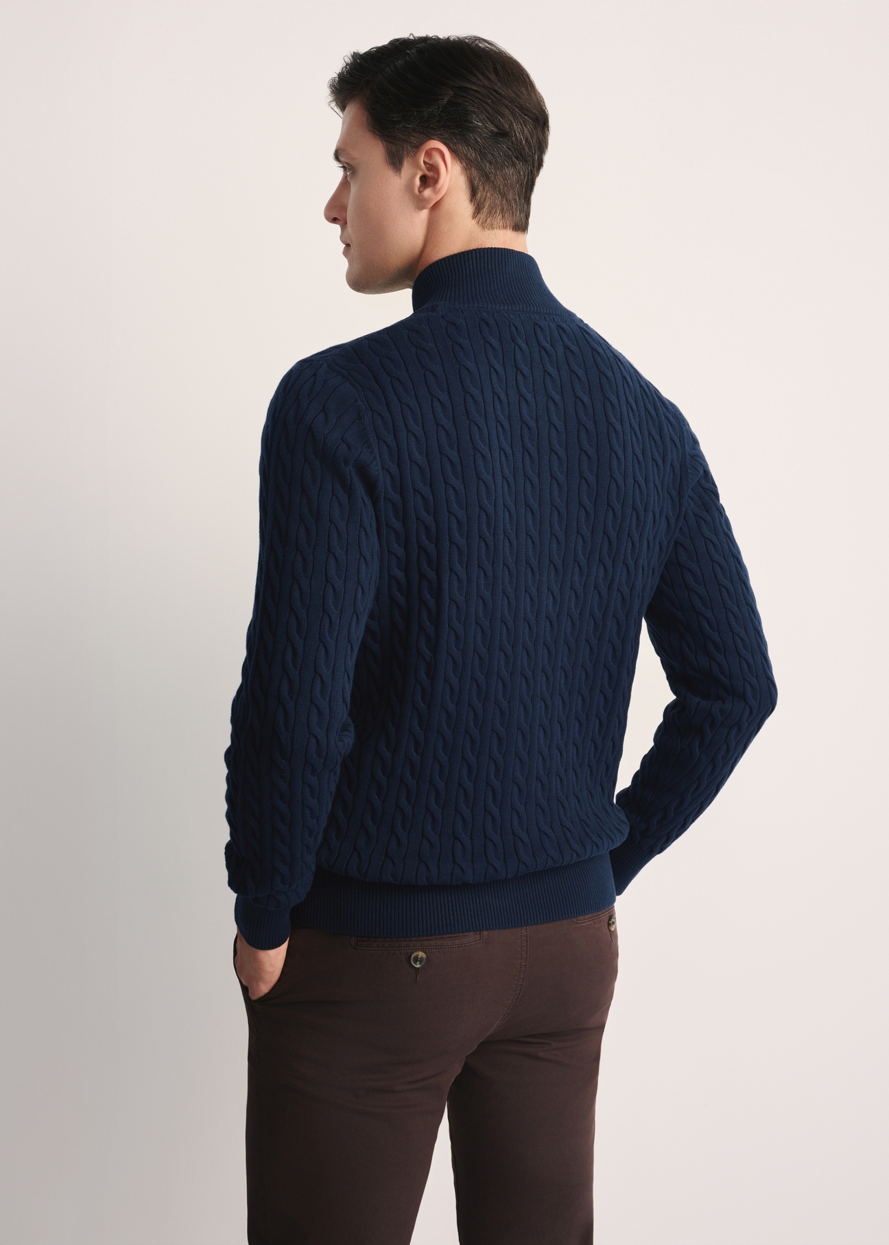 Navy blue men's zippered sweater SWEMT-0169-68(Z25), product visible from the back on the model, half of the silhouette visible.