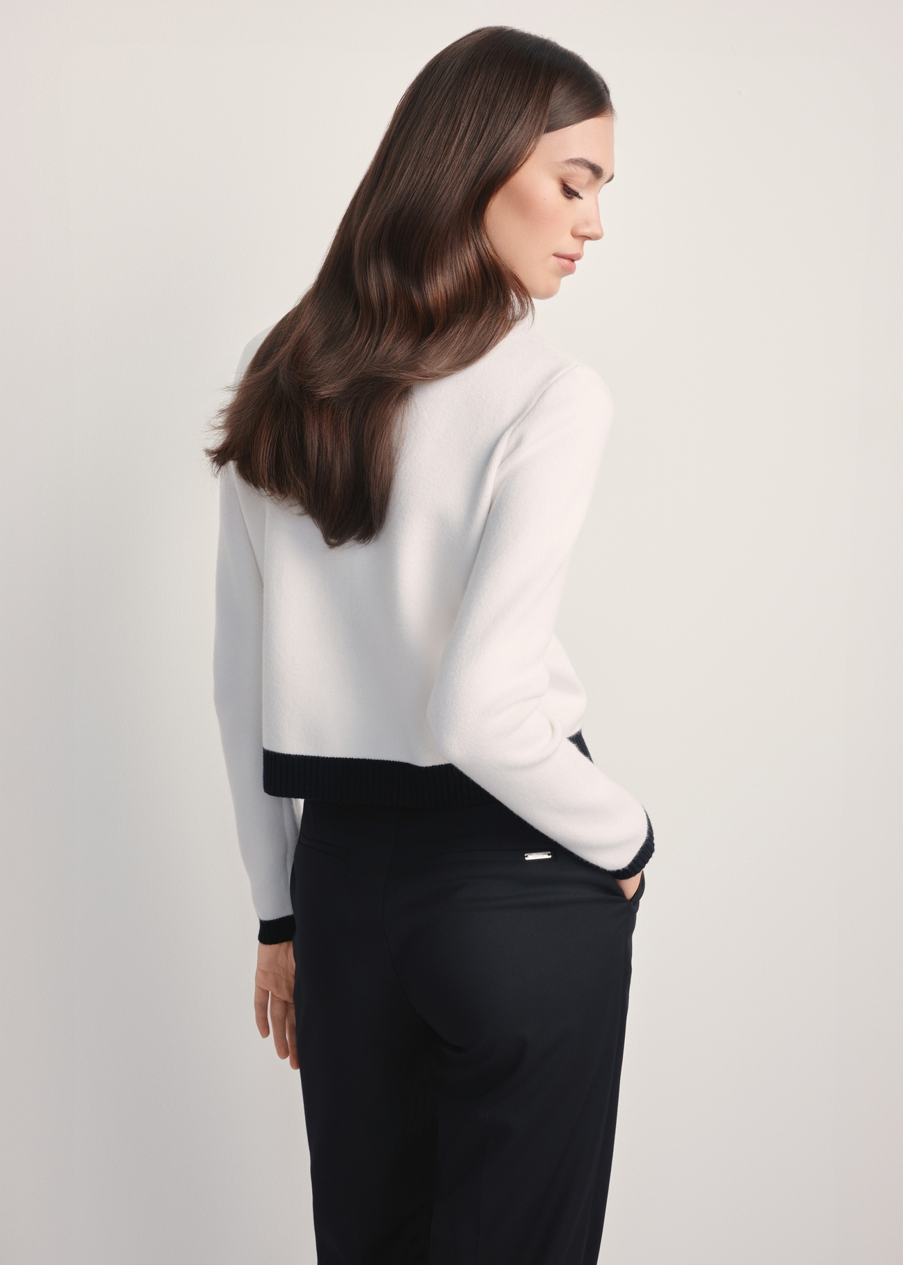 Women's white cardigan KARDT-0053-12(Z25), back view of the product on the model. Half of the silhouette visible.