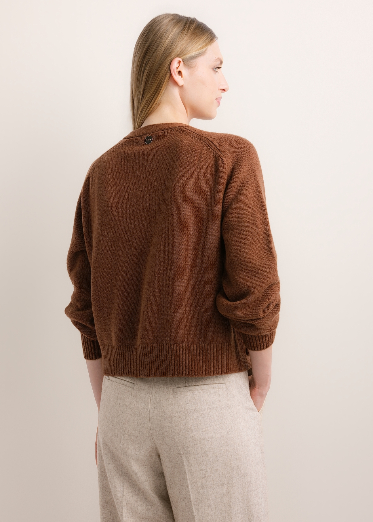Women's brown wool cardigan KARDT-0071-1H(Z26), product view from the back on the model. Half of the silhouette visible.