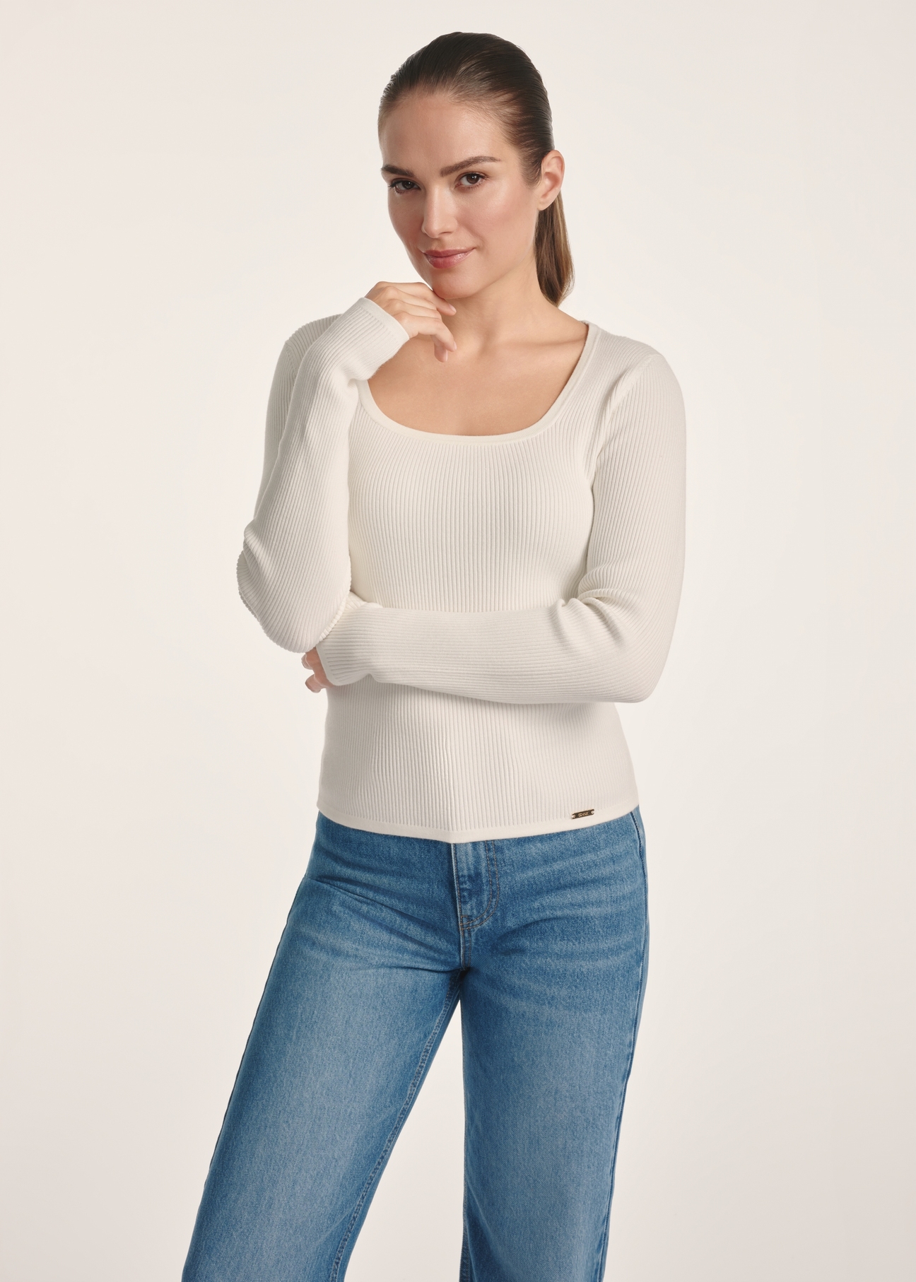 White women's long sleeve blouse LSLDT-0051-12(Z25), front view of the product on the model. Half of the silhouette visible.