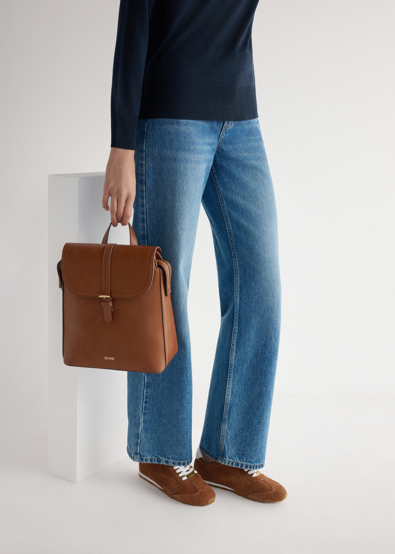 Women's suede shoes in camel color BUTYD-1276-1D(W26), side view of the product on the model's feet.