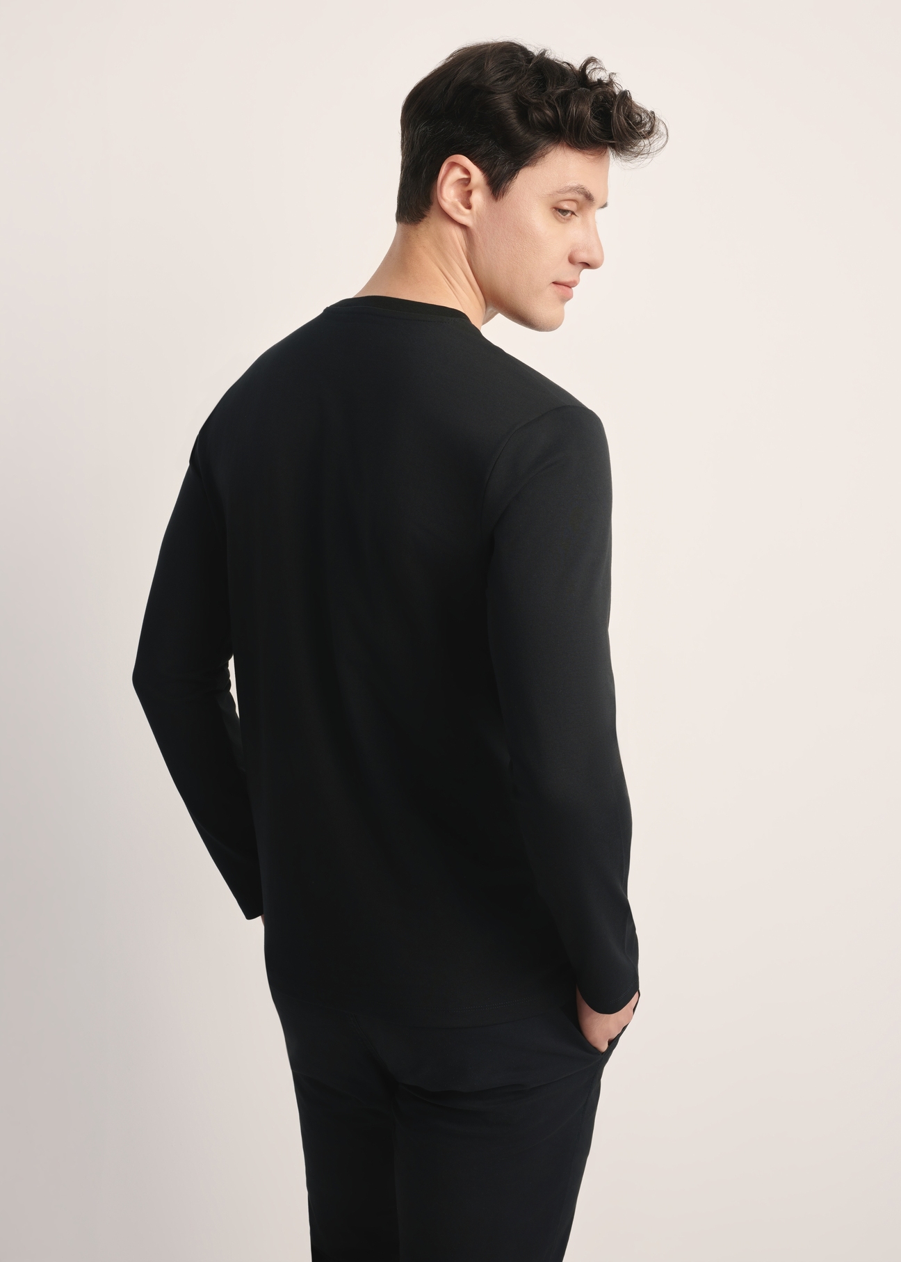 Black men's long sleeve blouse LSLMT-0008-99(Z25), product view from the back on the model. Half of the silhouette visible.