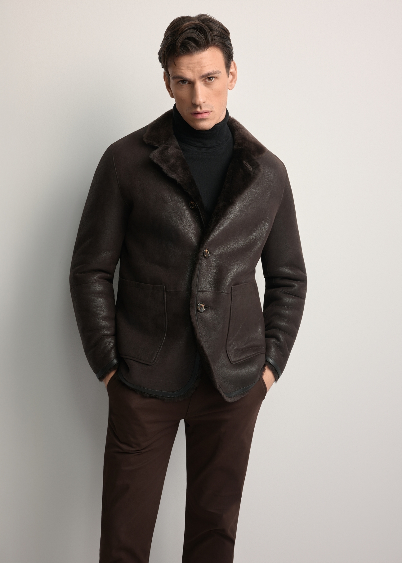 Men's brown leather sheepskin coat KOZMS-0025-3190(Z25), front view of the product on the model. Half of the silhouette visible.