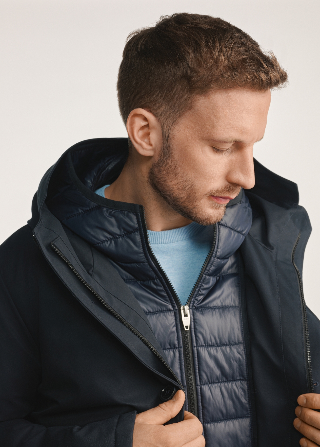 Navy blue men's winter jacket KURMT-0387-69(Z25), close-up of product detail, view on model.