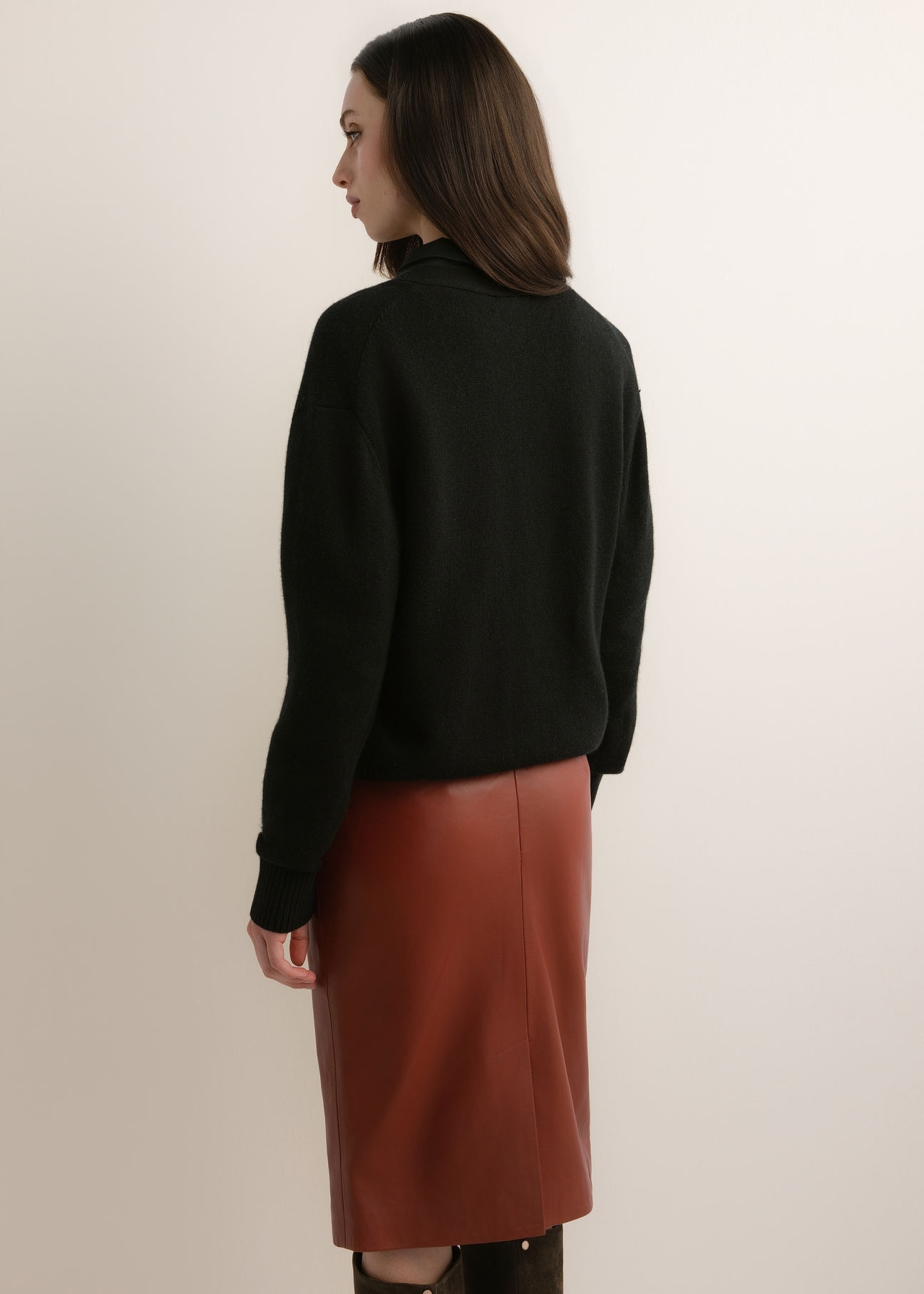 Women's black wool-blend cardigan KARDT-0070-99(Z26), back view of the product on the model. Half of the silhouette visible.