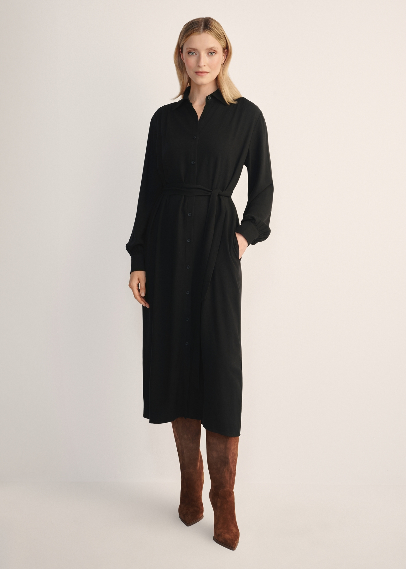 Women's black long-sleeved dress SUKDT-0246-99(Z25), front view of the product on the model. Full body visible.