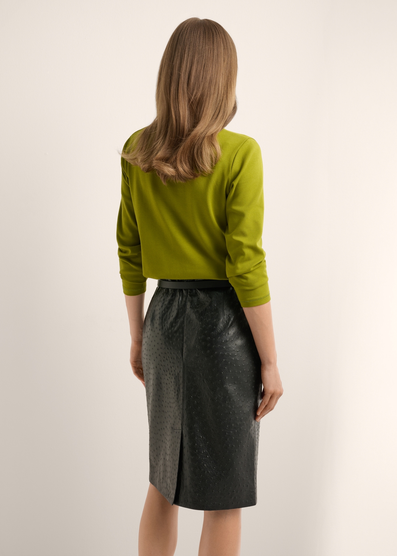 Women's olive cotton longsleeve LSLDT-0052-8E(Z26), back view of the product on the model. Half of the silhouette visible.