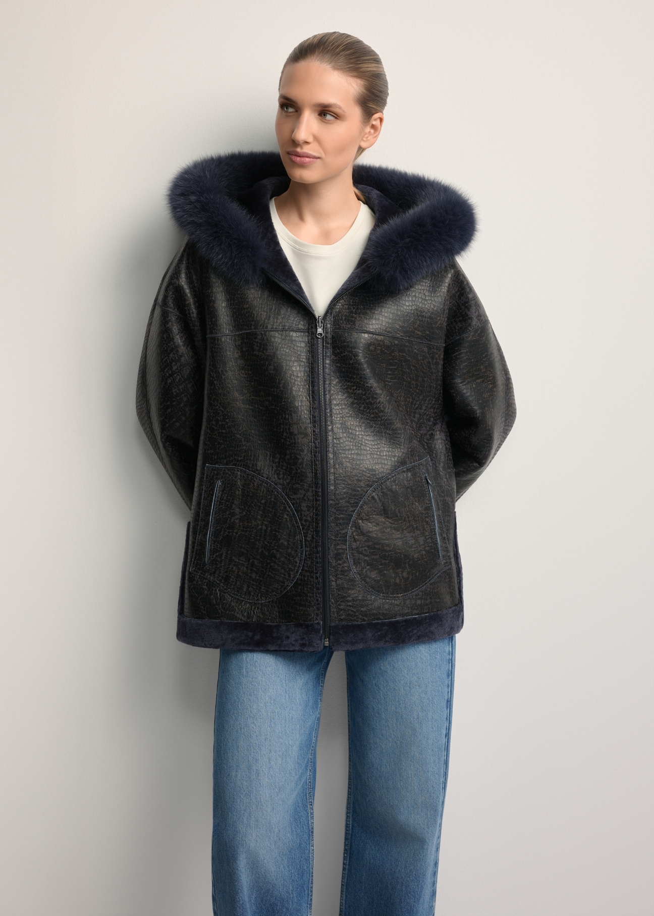 Women's double-sided leather sheepskin coat KOZDS-0094-1397(Z25), front view of the product on a model. Half of the silhouette visible.