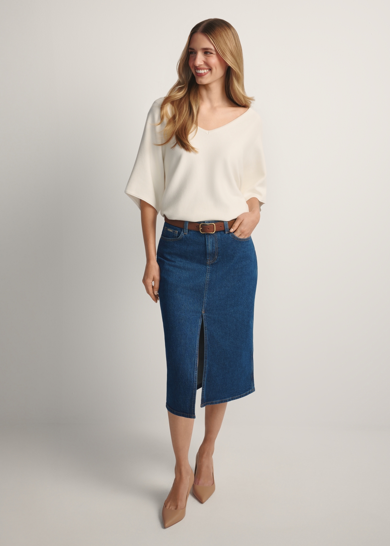 SPCDT-0119-7H(W26) denim midi skirt, front view of the product on the model. Full body visible.