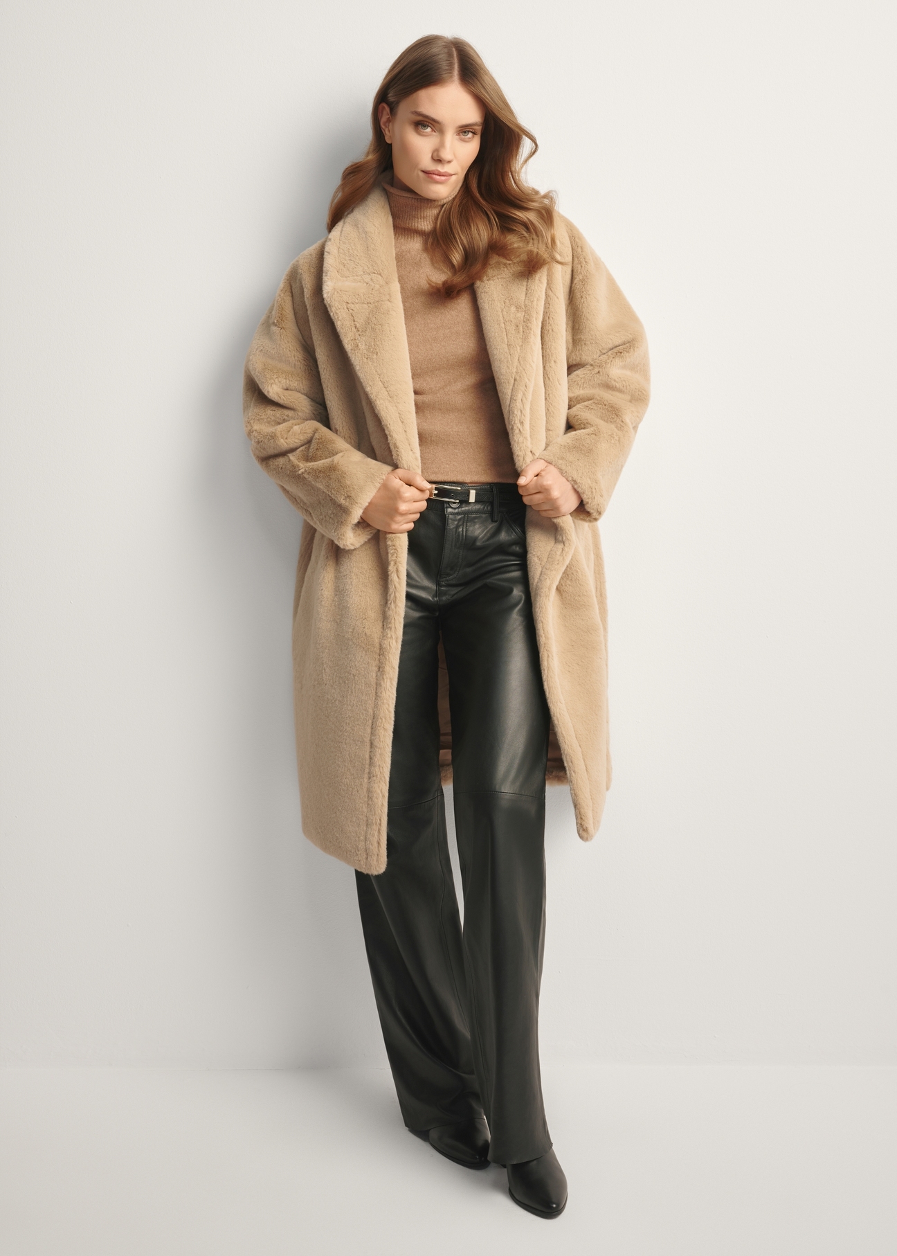 Long beige women's fur coat FUTDP-0064-81(Z25), product view from the front on the model, the entire silhouette is visible.