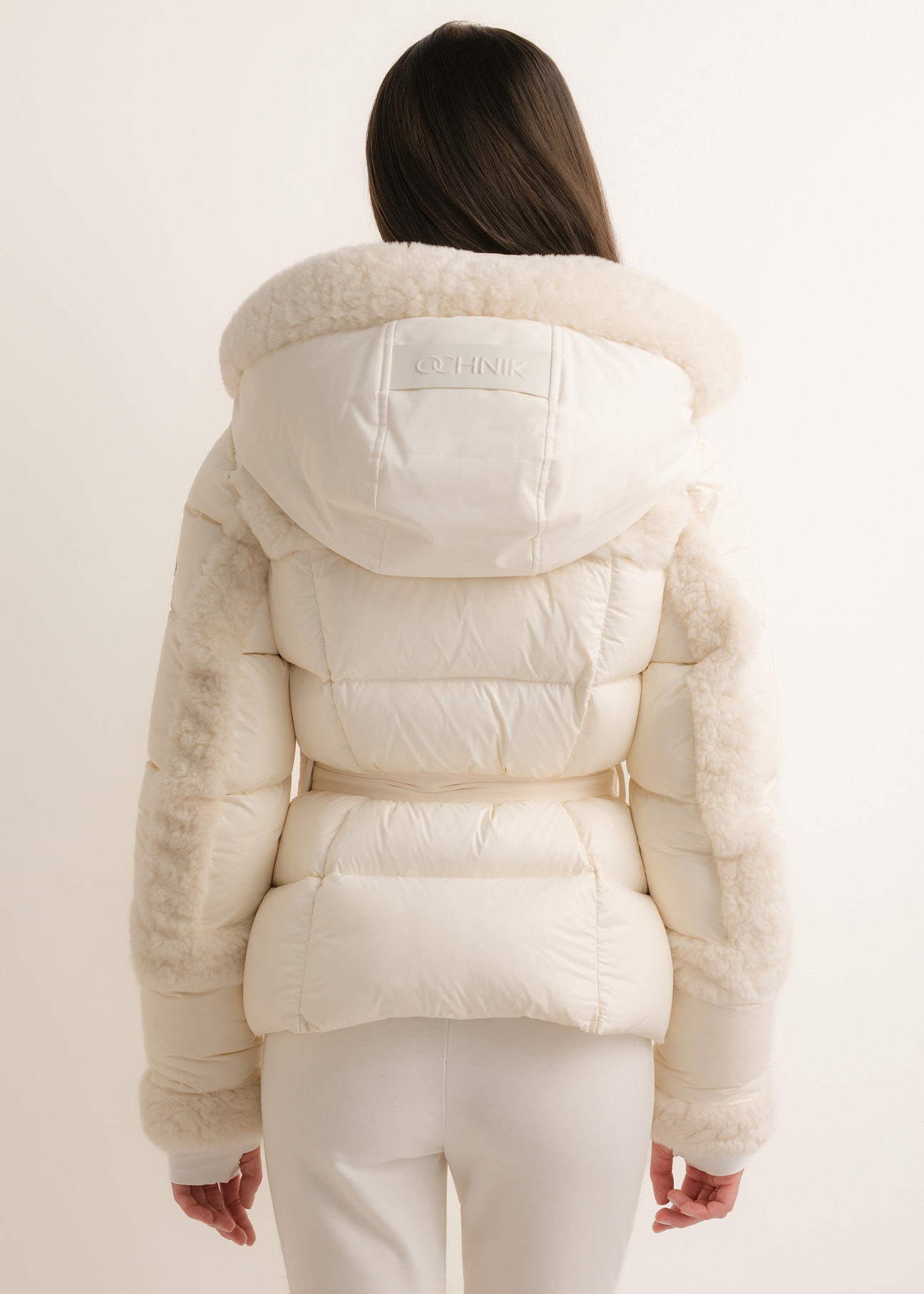 Light beige women's winter jacket KURDT-0705-1A(Z26), rear view on a model. Half-body shot.