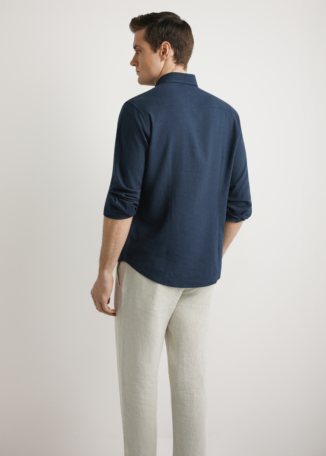 Men's navy linen shirt KOSMT-0362-7E(W26) - back view of the product, on a model, against a light background. Half of the silhouette visible.