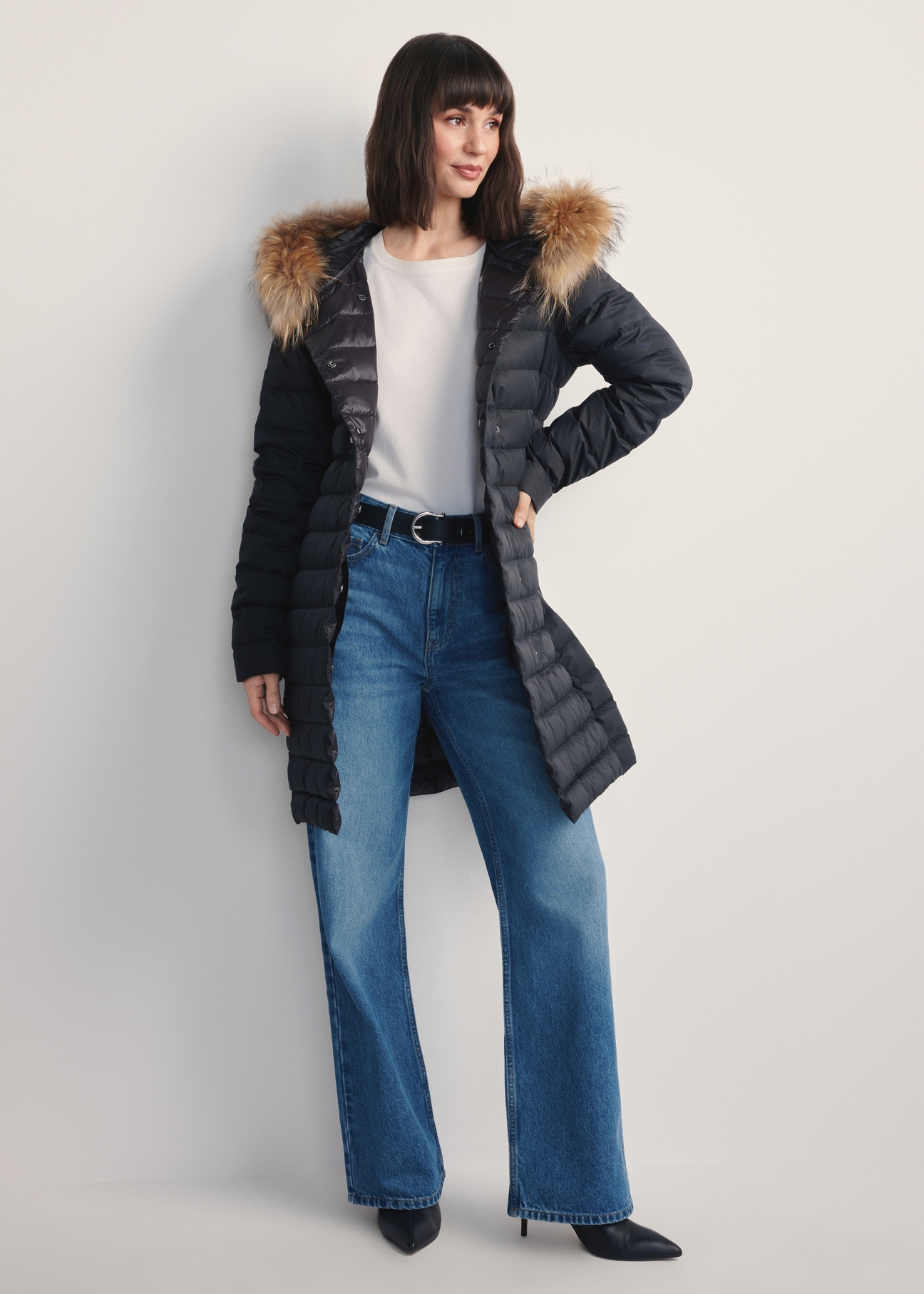 Women's black winter jacket KURDT-0617-99(Z25) - front view of the product on a model against a white background. Full body visible.