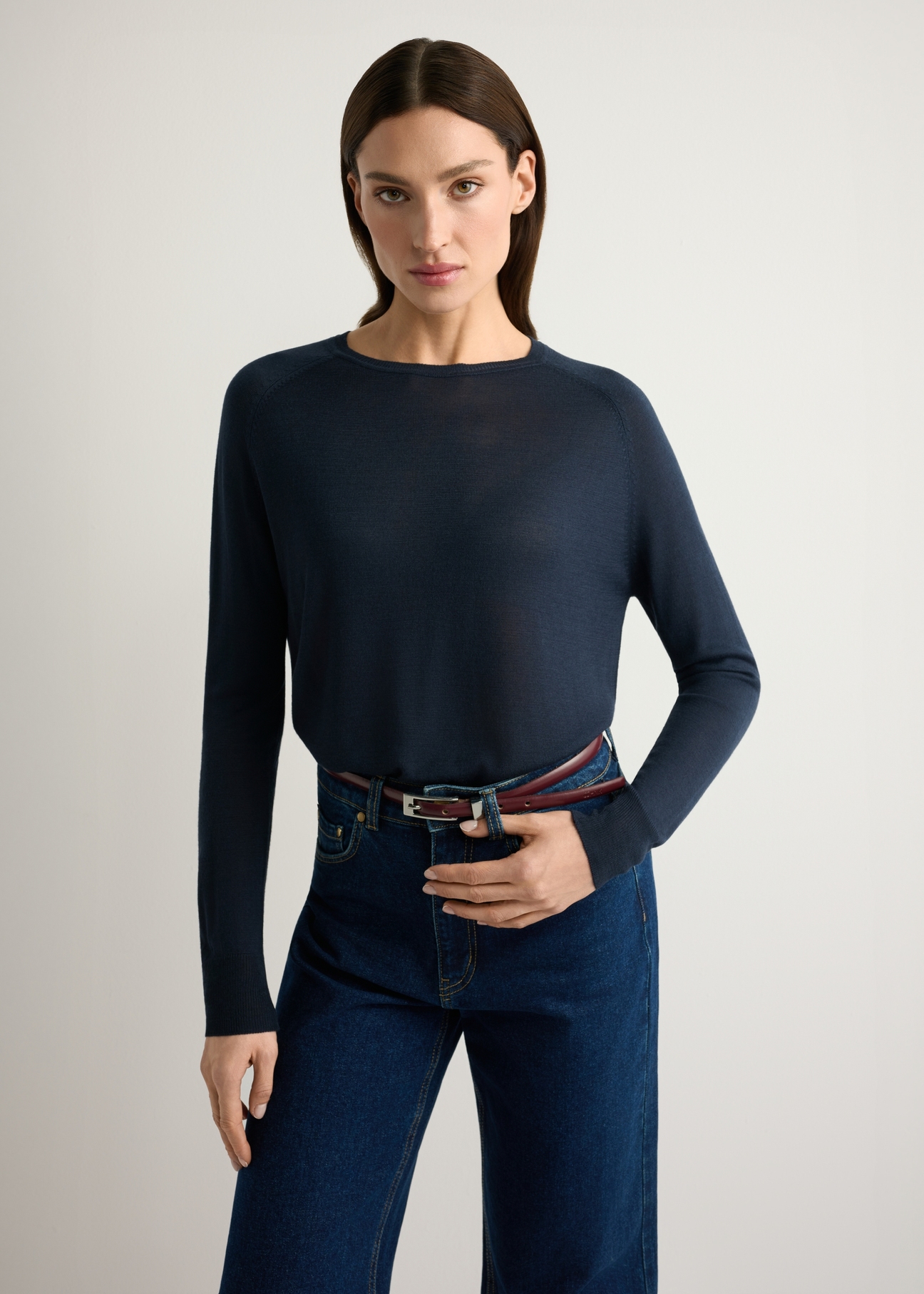 Thin navy blue women's sweater SWEDT-0257-7E(W26), product view from the front on the model, half of the silhouette visible.