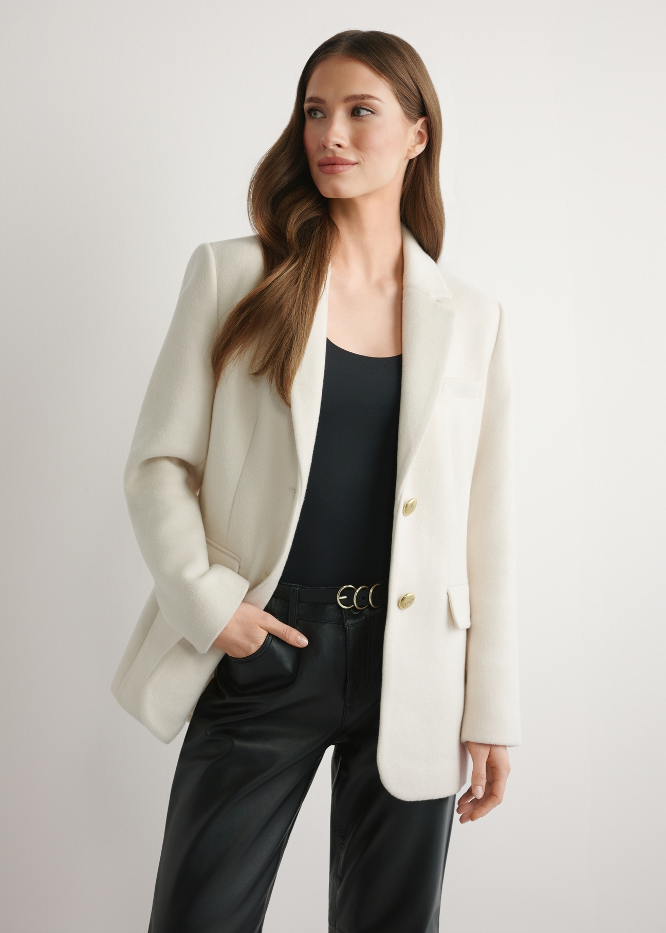 Women's white wool coat PLADT-0072-0B(W26) - front view of the product, on a model against a light background. Half of the silhouette visible.