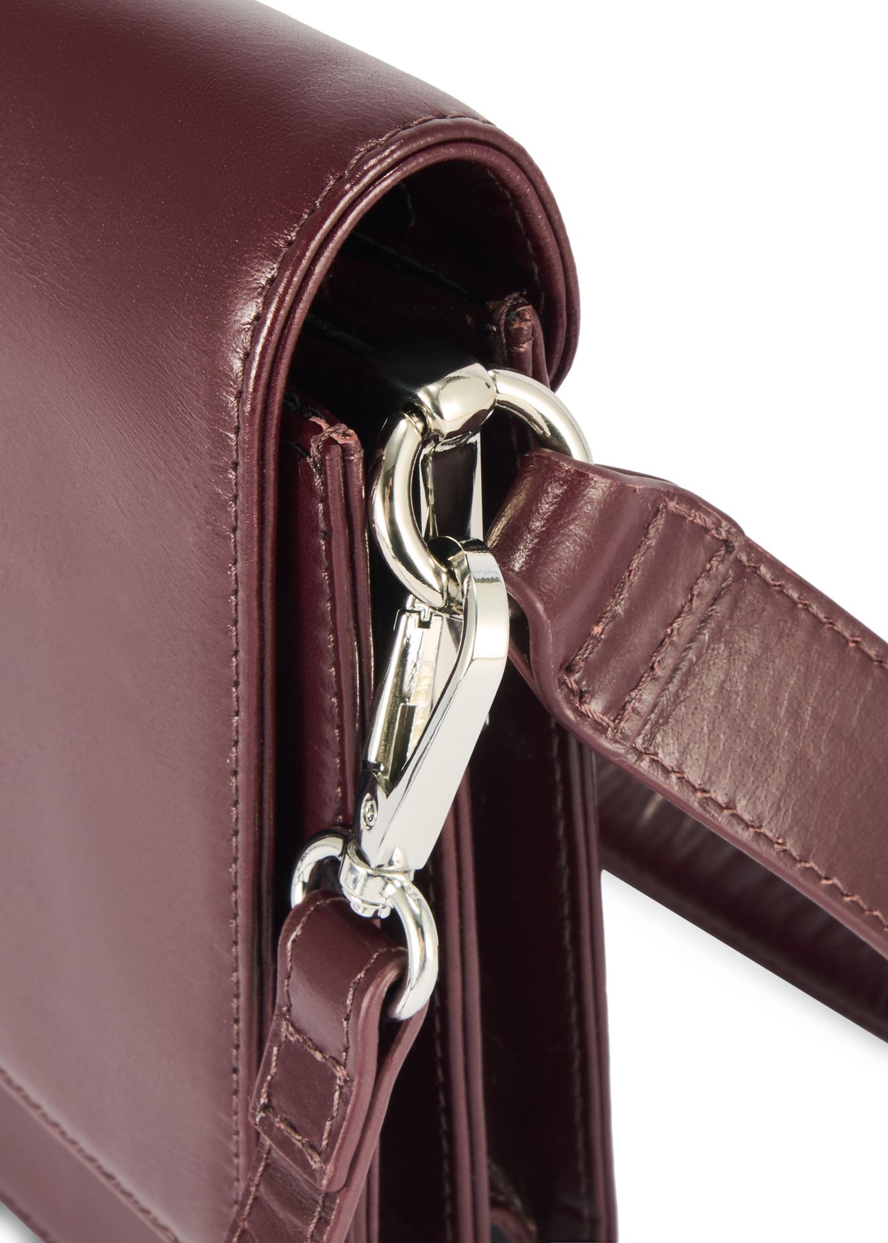 Women's leather handbag in burgundy color TORES-1189-49(Z25) - close-up of the detail on a white background.