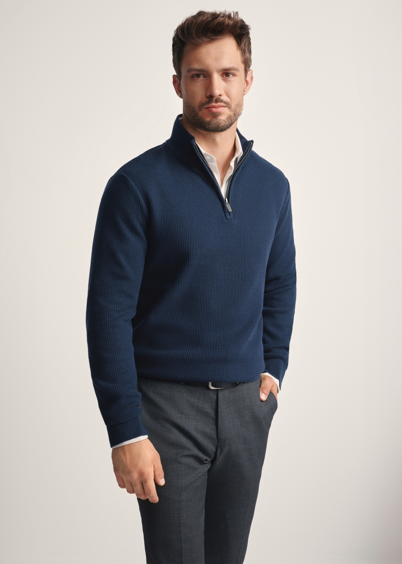 Men's navy blue zippered sweater SWEMT-0167-68(Z25), front view of the product on the model. Half of the silhouette visible.