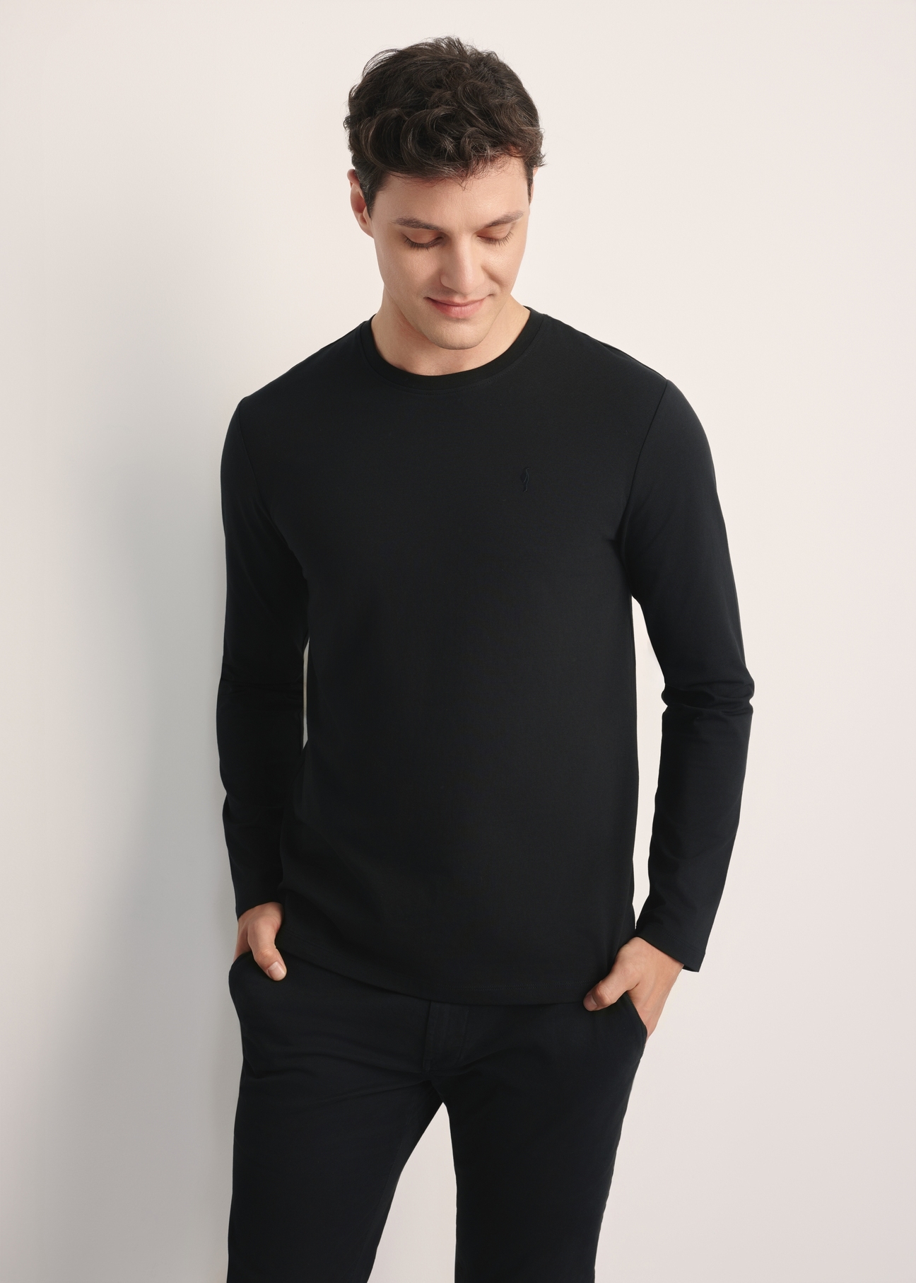 Black men's long sleeve blouse LSLMT-0008-99(Z25), front product view on the model. Half of the silhouette visible.