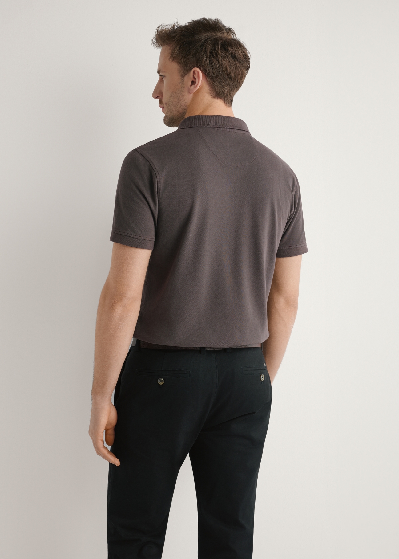 Men's brown polo shirt POLMT-0055A-1I(W26), back view of the product on the model. Half of the silhouette visible.