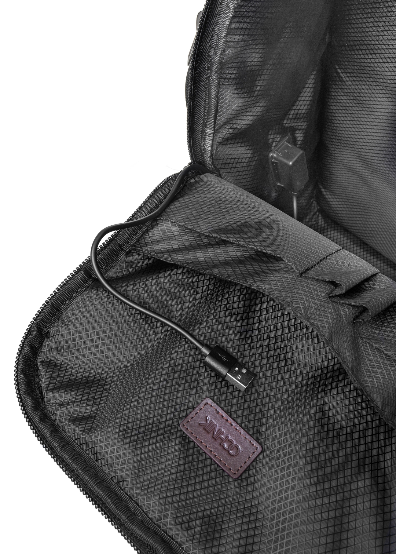 Black spacious men's backpack TORMN-0378-98(Z25), close-up of the product detail, view on a white background.