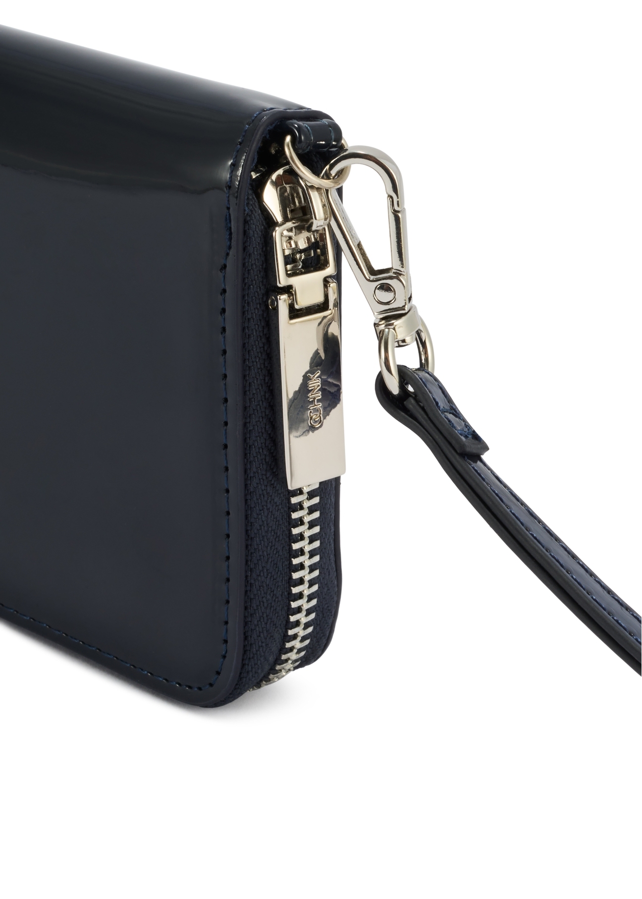 Large navy blue women's wallet POREC-0418-69(Z25), close-up of the product's zipper, view on a white background.