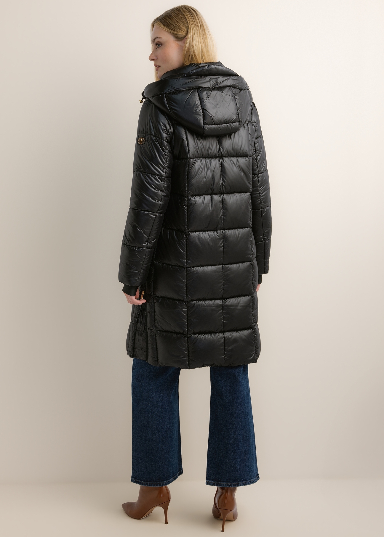 Black women's winter jacket KURDT-0677-99(Z26), product view from the back on the model. Full body visible.