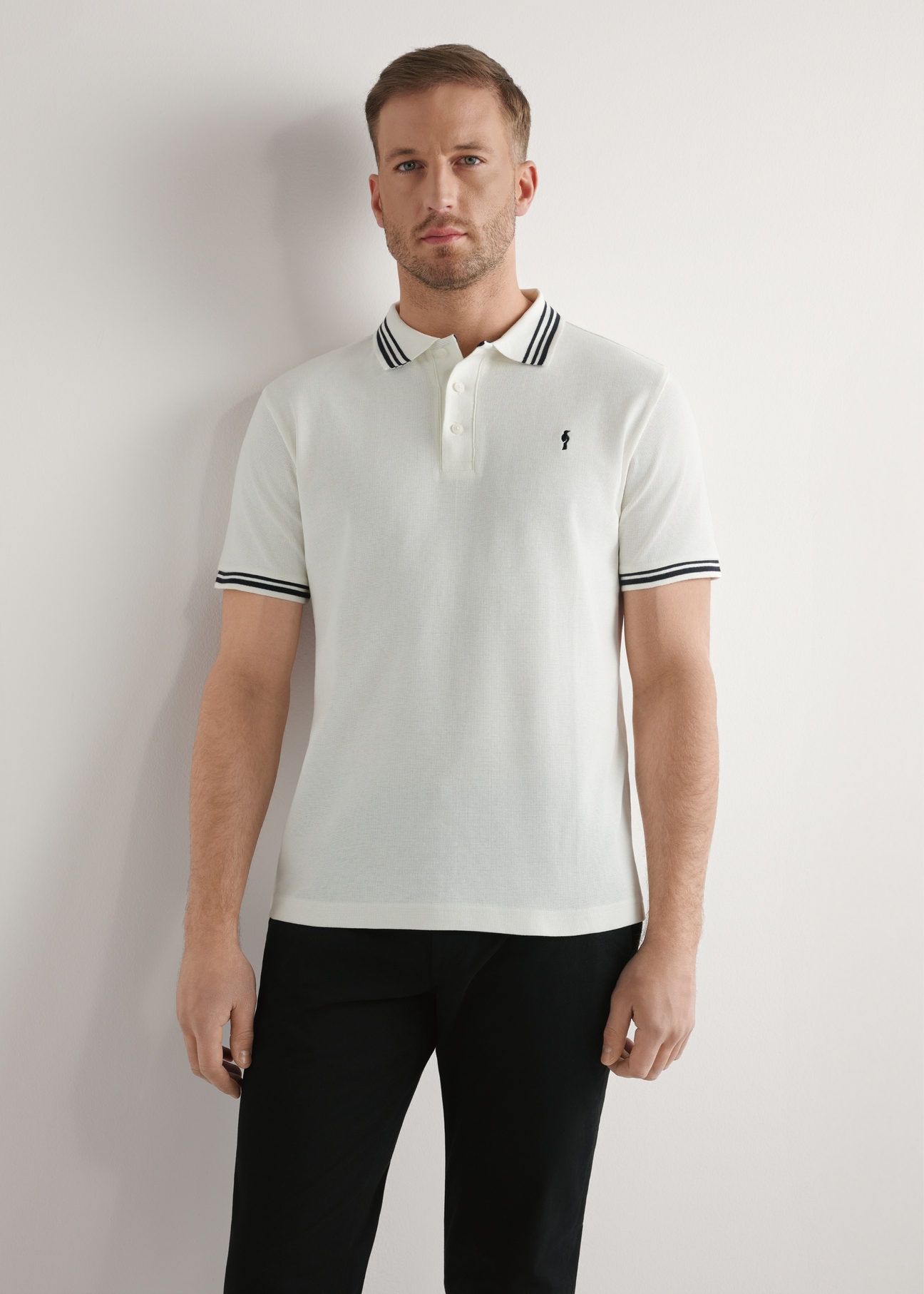 Cream men's polo shirt POLMT-0091-0B(W26), front view of the product on the model. Half of the silhouette visible.