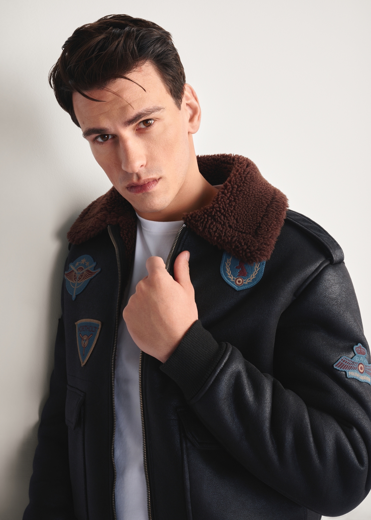 Brown men's sheepskin coat in aviator style KOZMP-0007-90(Z25) - close-up of a model on a white background.