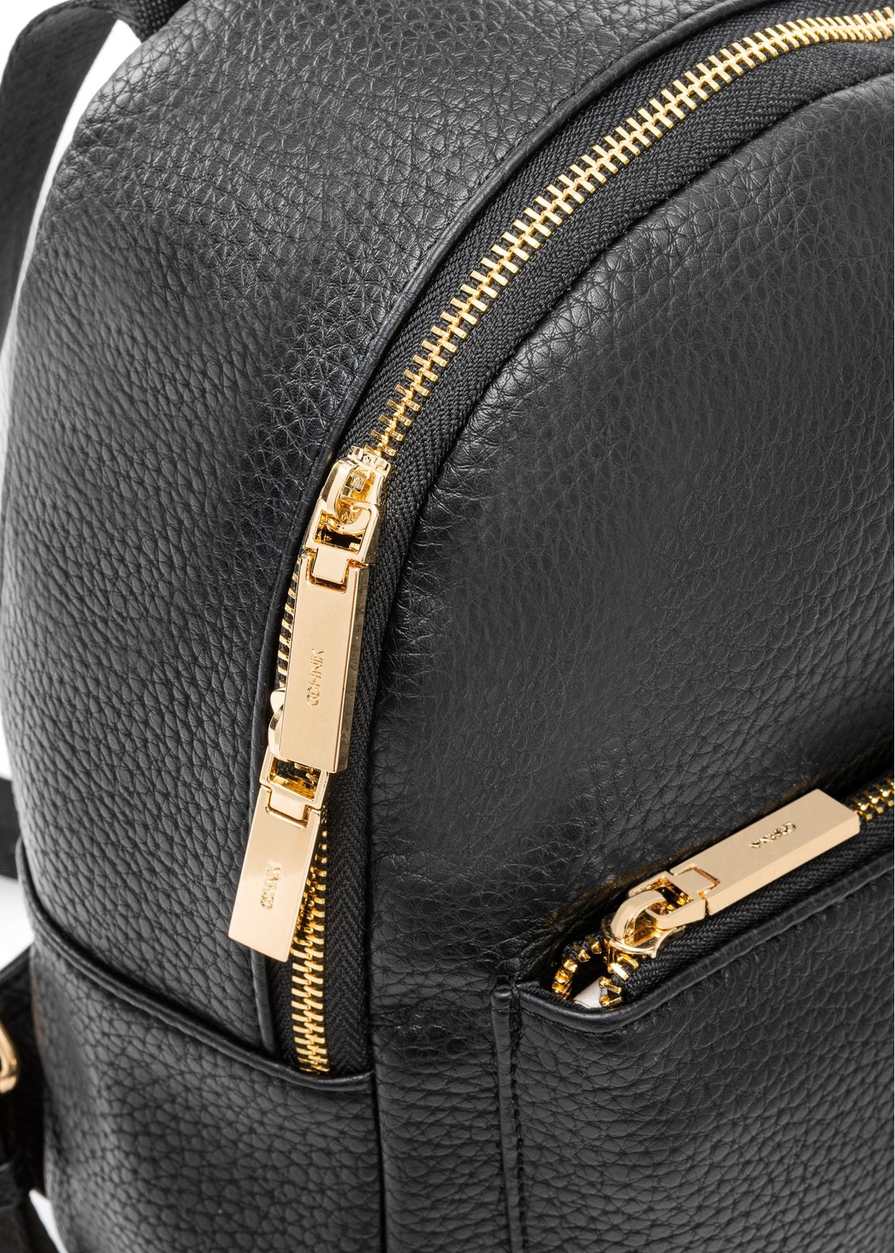 Black women's backpack TOREC-0996A-99(Z25), close-up of product details on white background.