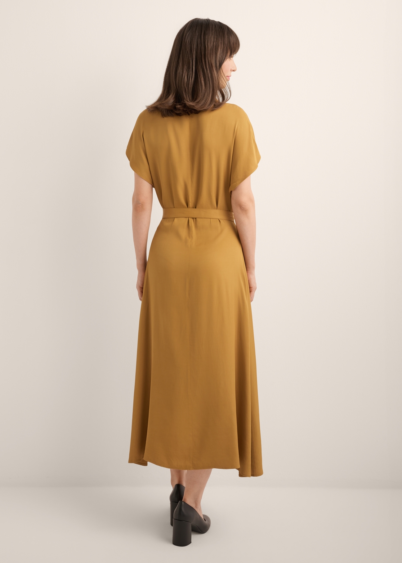 Mustard modal dress SUKDT-0287-2D(Z26), back view of the product on the model. Full body visible.