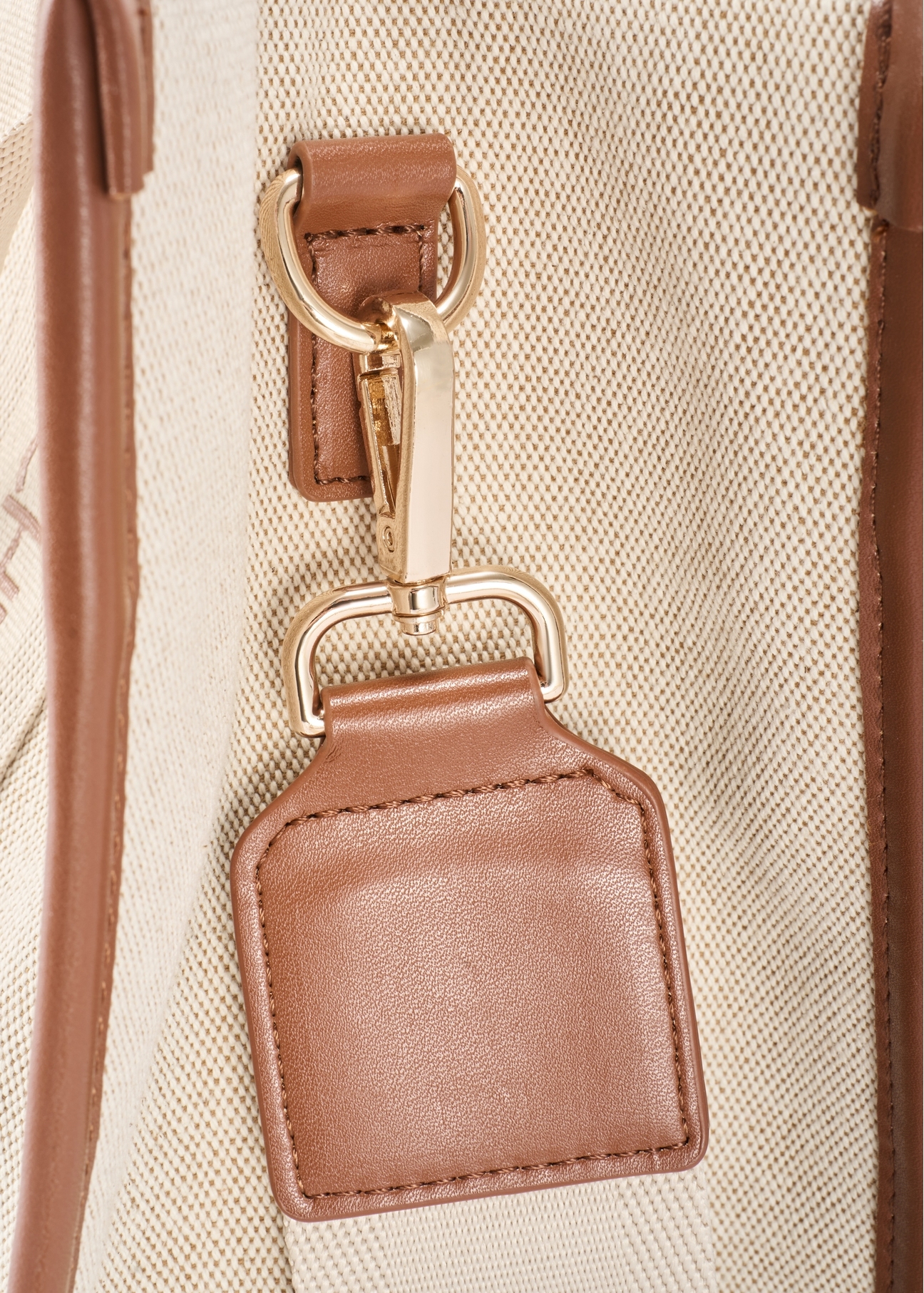Beige women's tote bag TOREN-0288A-1E(W26), close-up of product detail on white background.