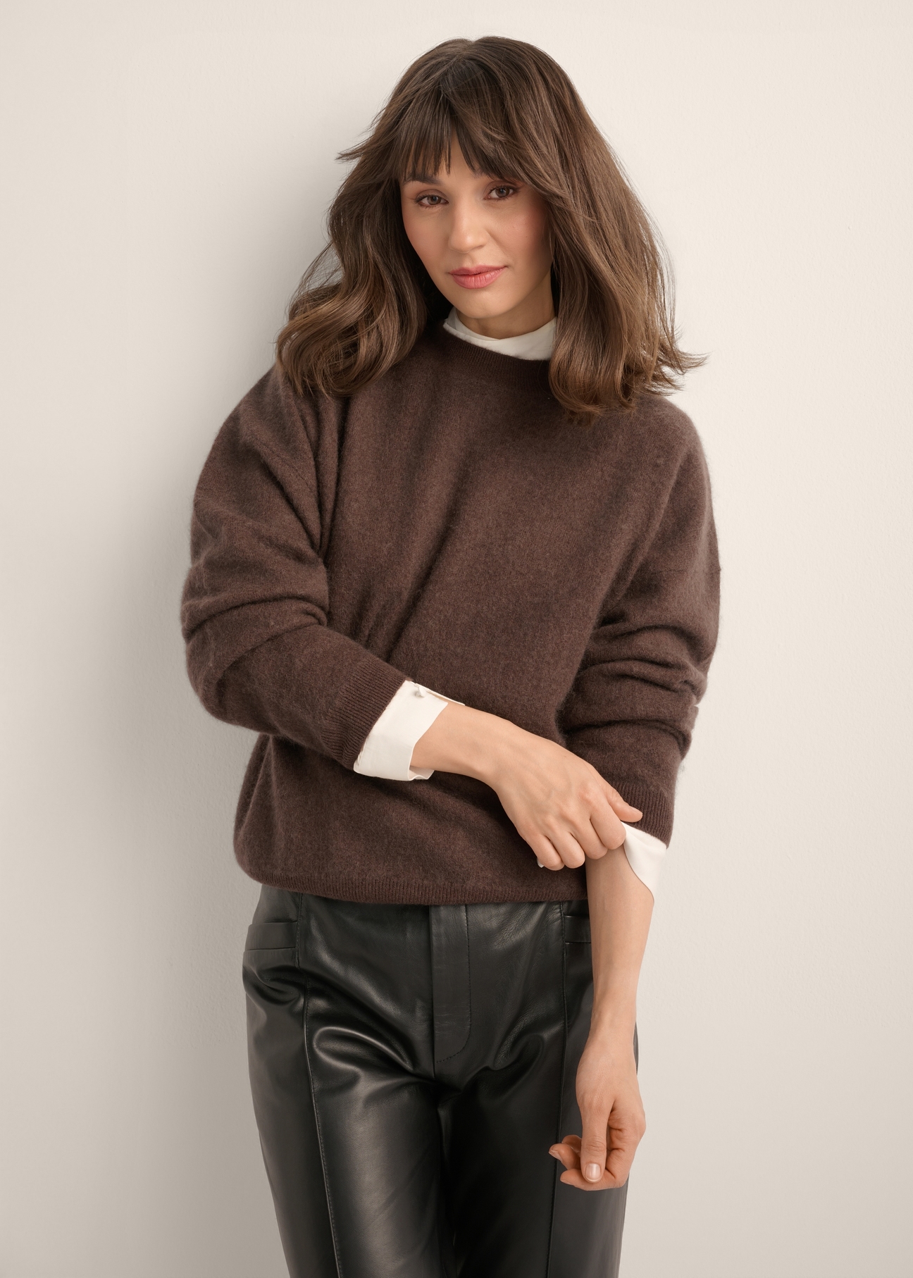Women's woolen brown sweater SWEDT-0265-1I(Z26), front view of the product on the model. Half of the silhouette visible.