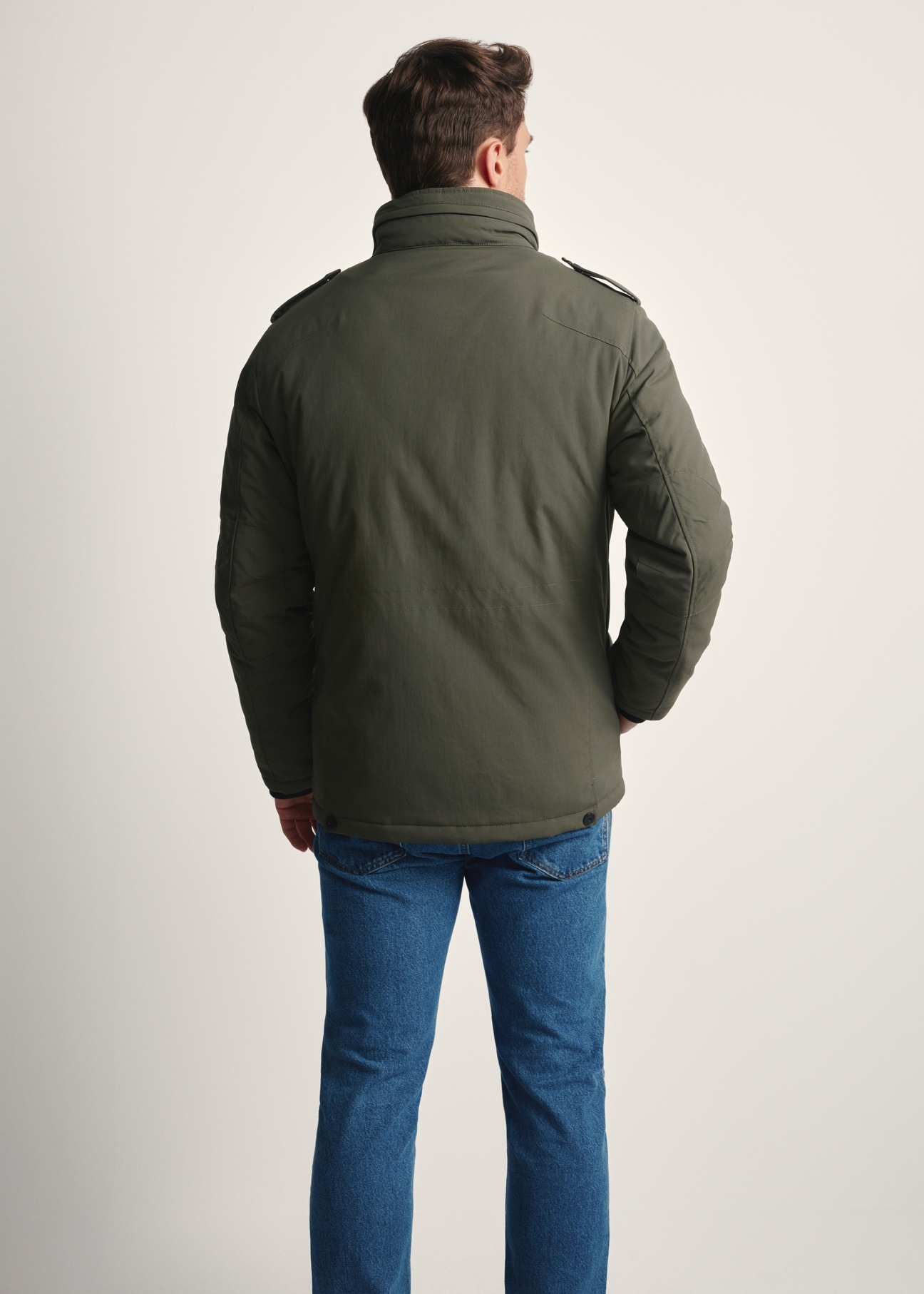 Men's olive transitional jacket KURMT-0392-57(Z25) - product view from the back of the model against a white background. Half of the silhouette visible.