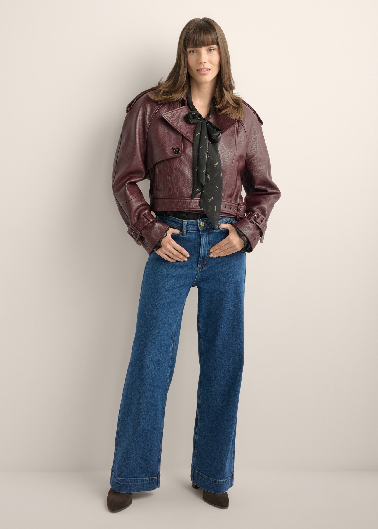 Women's burgundy short leather jacket KURDS-0615-4E(Z26), front view of the product on a model. Full body visible.