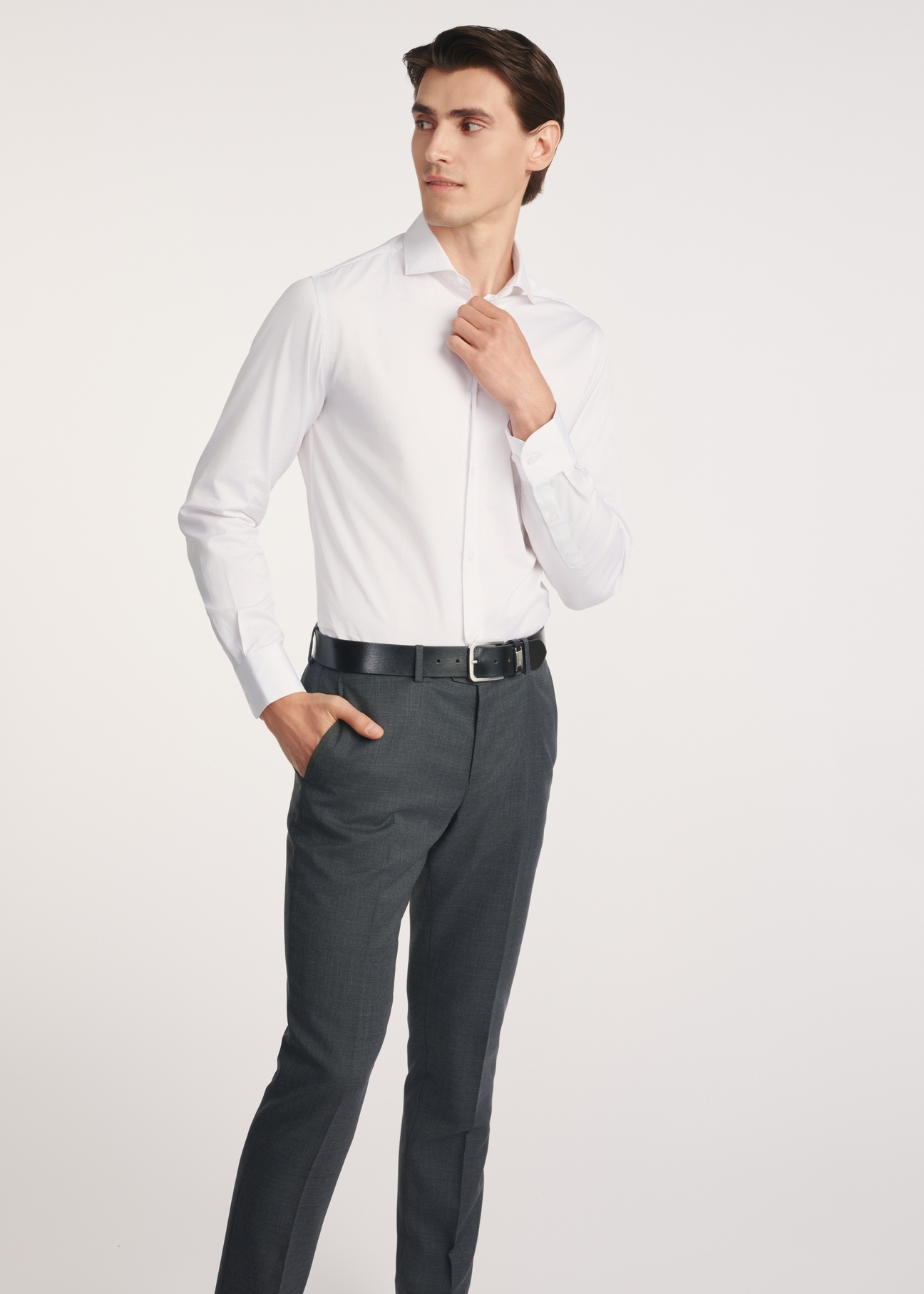 White men's shirt KOSMT-0352-11(Z25), front view of the product on the model, part of the silhouette visible.