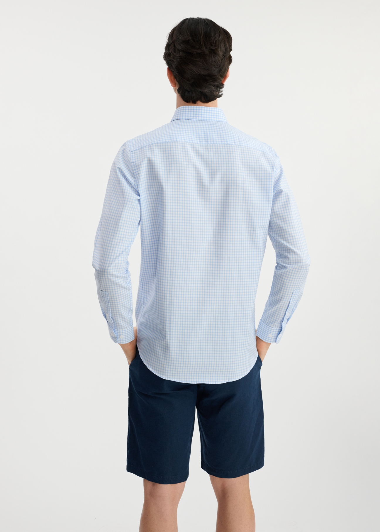 Men's cotton shirt in light blue check KOSMT-0277-63(W25) - back view on model on white background. Half of the silhouette visible.