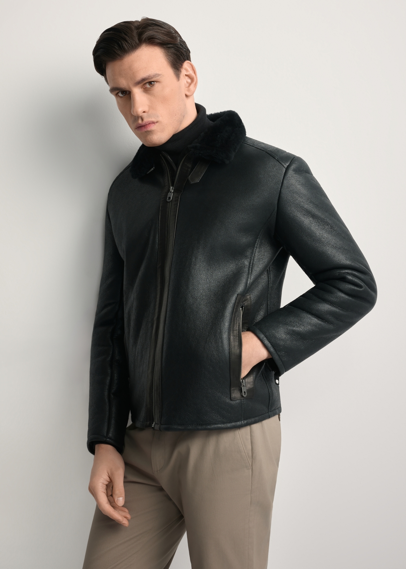 Men's sheepskin coat KOZMS-0001-1161(Z25), front view of the product on the model. Half of the silhouette visible.