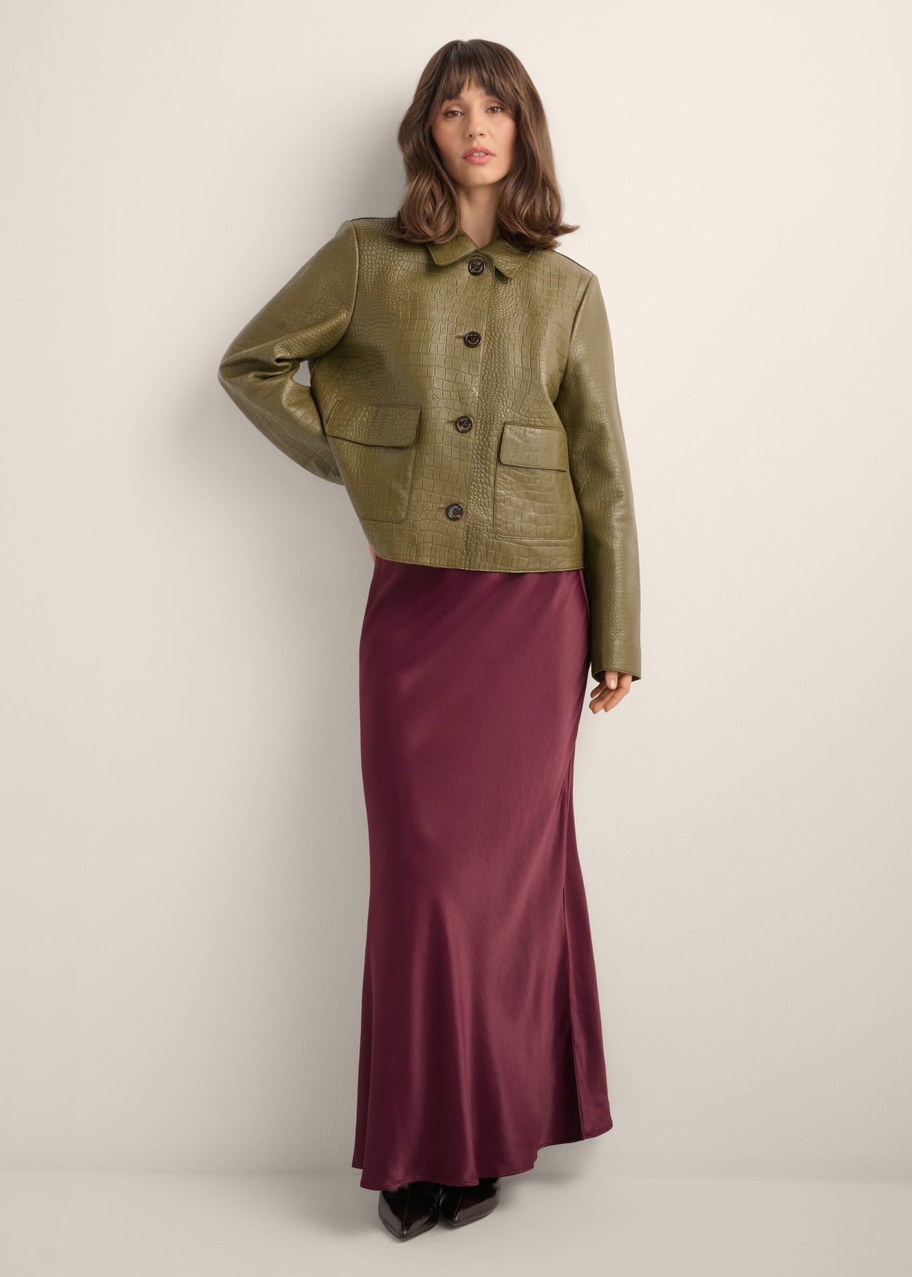 Women's burgundy long skirt SPCDT-0117-4D(Z26), front view of the product on the model. Full body visible.