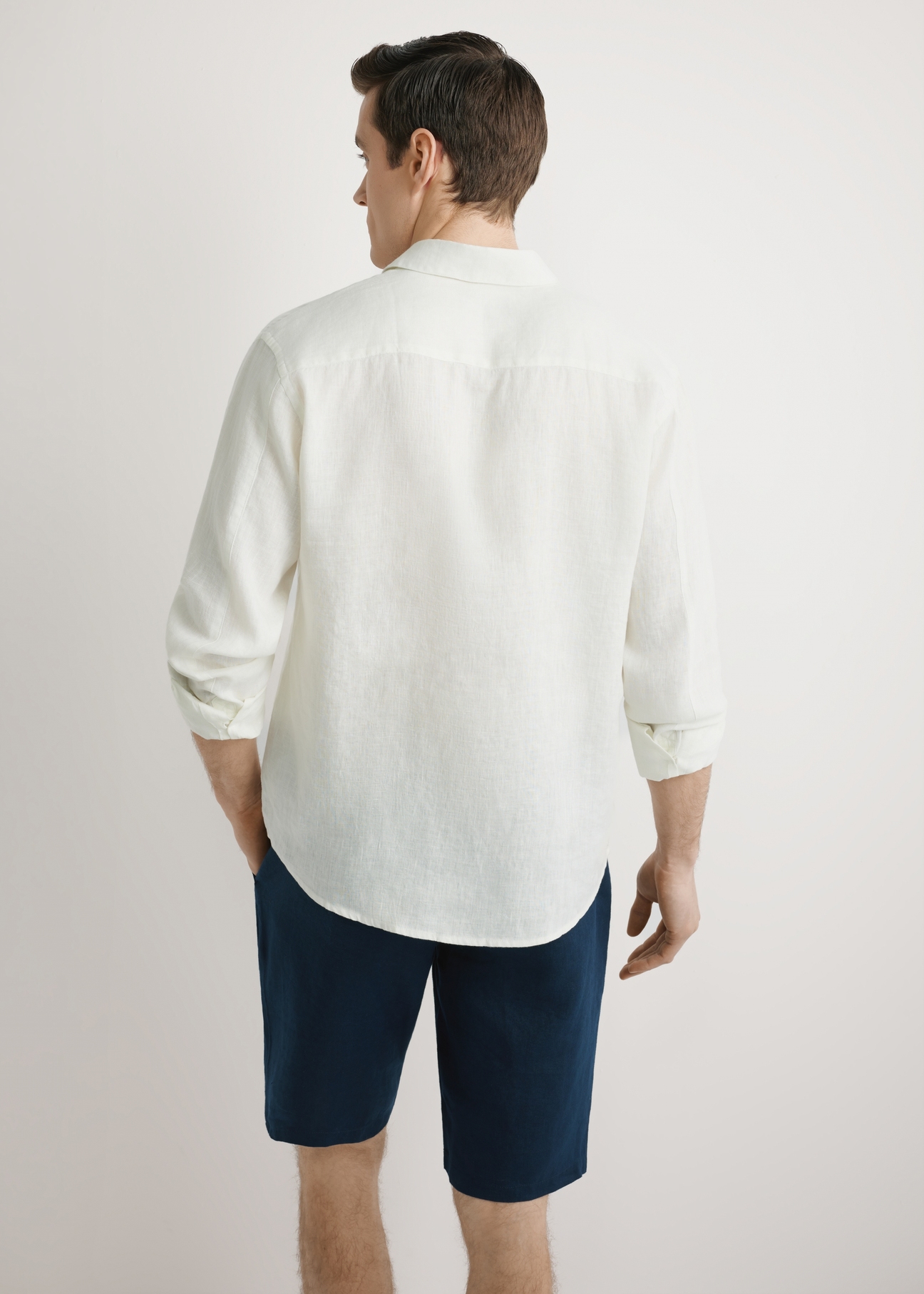 Cream linen men's shirt KOSMT-0321A-0B(W26) - back view of the product, against a light background. Half of the silhouette visible.