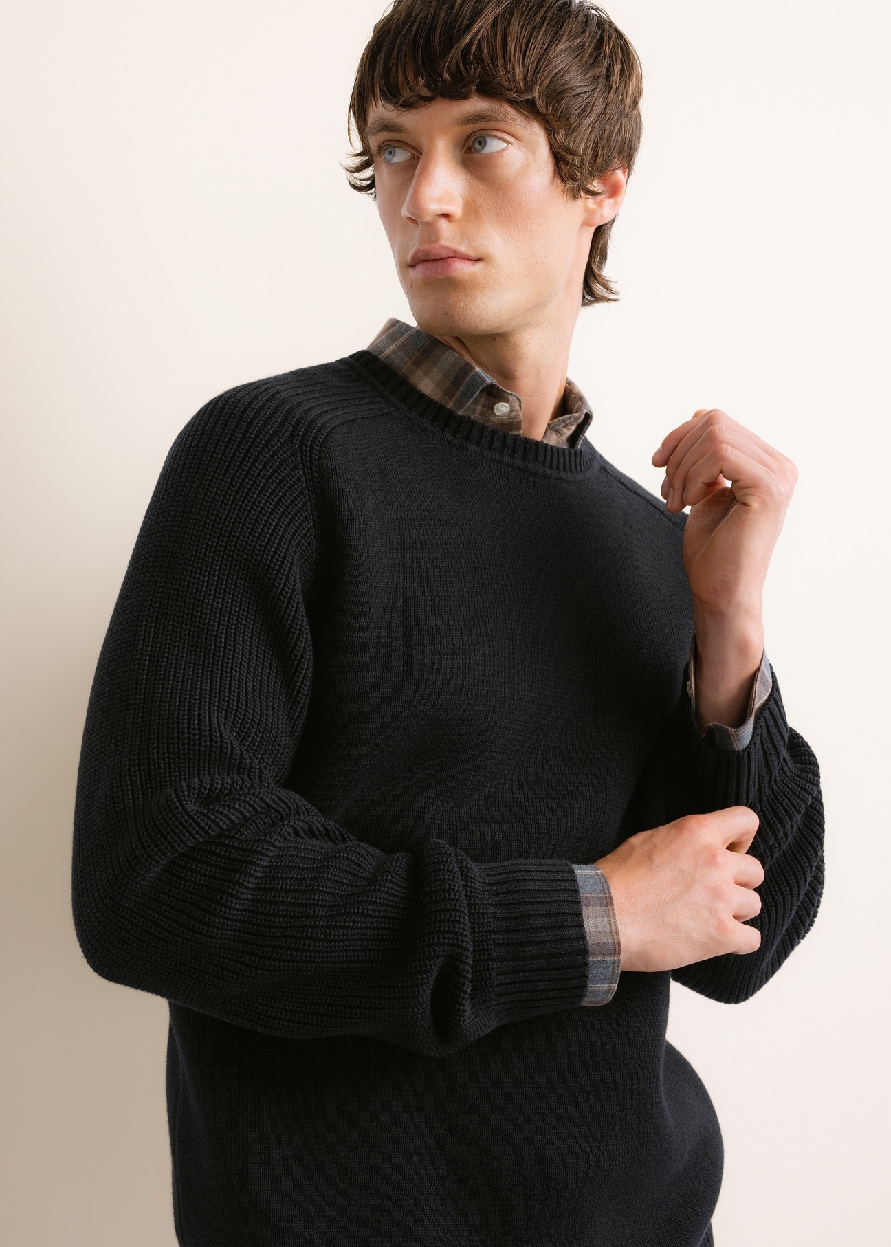 Men's black cotton sweater SWEMT-0208-99(Z26), close-up of the product on a model against a light background.